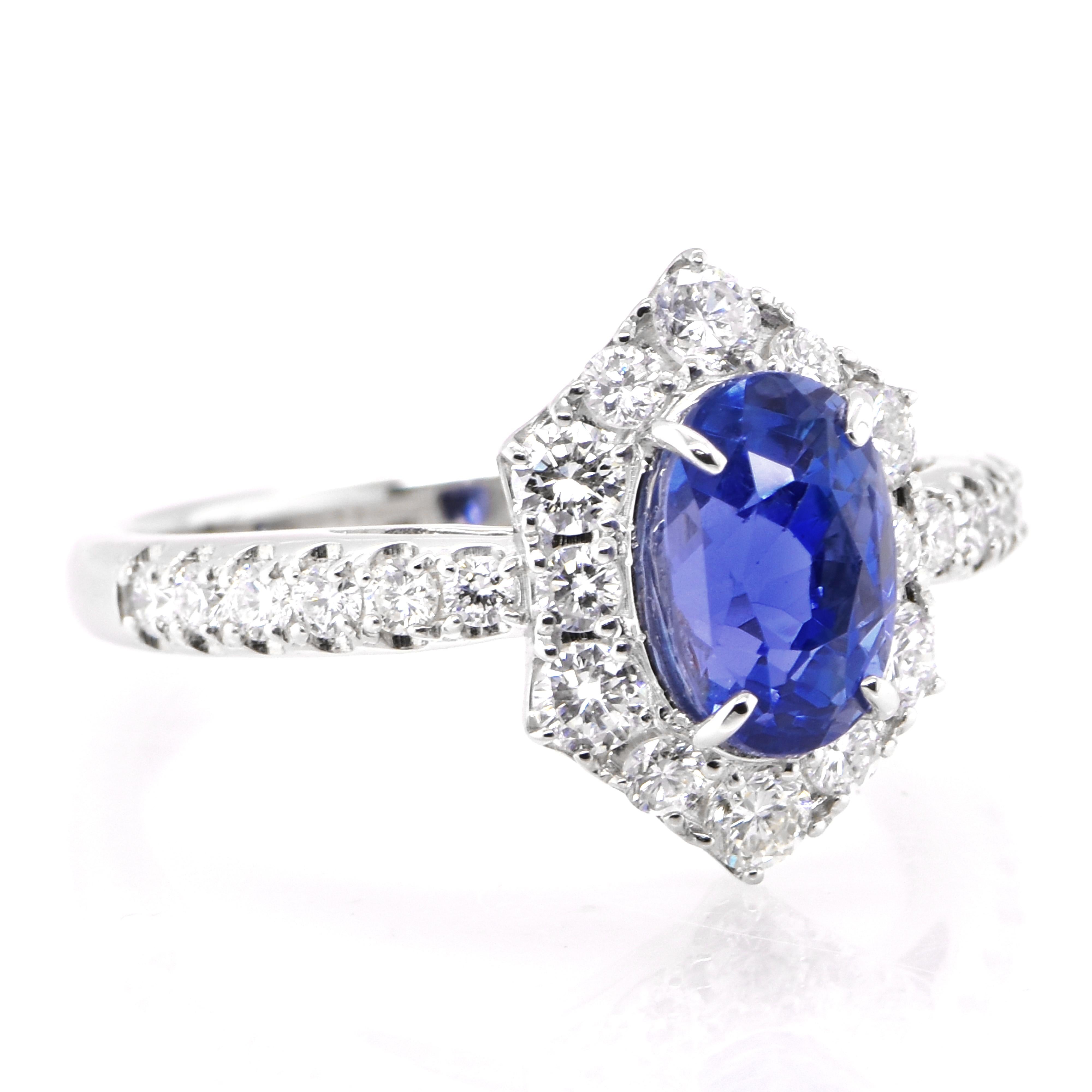 Modern 2.27 Carat Natural Unheated, Ceylon Sapphire and Diamond Ring set in Platinum For Sale