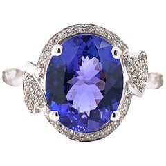 Used 2.27 Carat Oval Shaped Tanzanite Ring in 18 Karat White Gold with Diamonds