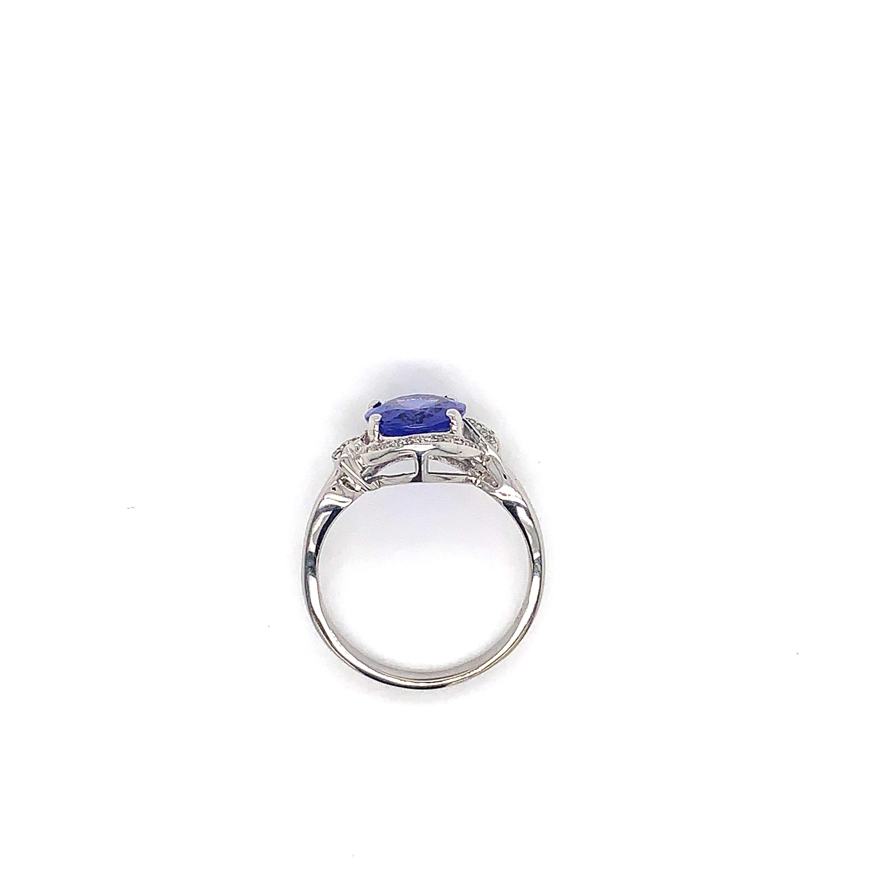 Oval Cut 2.27 Carat Oval Shaped Tanzanite Ring in 18 Karat White Gold with Diamonds For Sale
