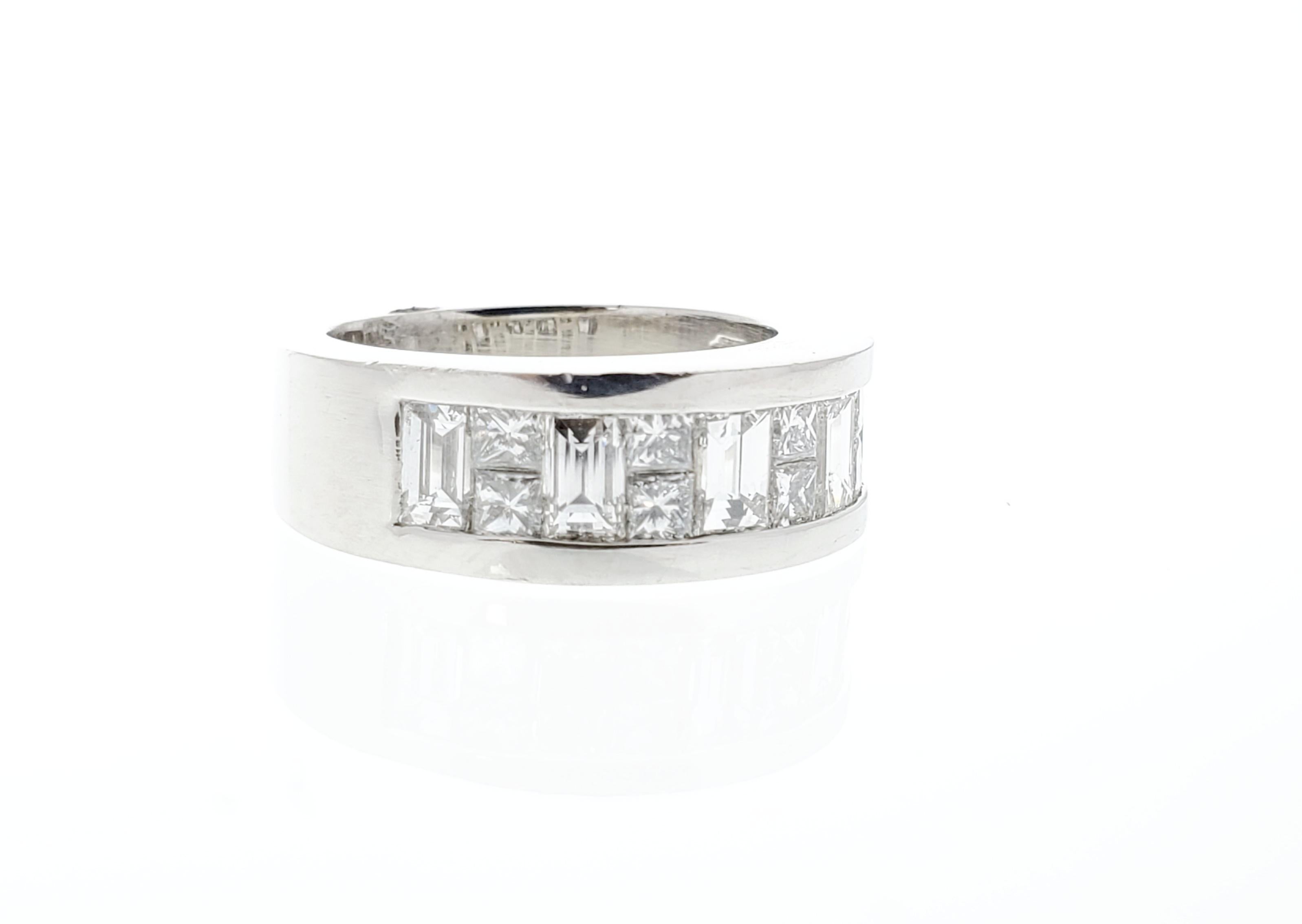 This brightly polished platinum ring exudes an ultimate style and prestige with its incredible sparkle and fire. A total of 2.27 carats of princess and baguette cut diamonds are arranged in a stunning setting, allowing maximum fire and scintillation
