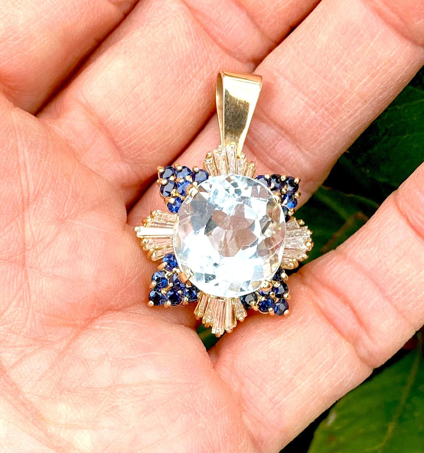 Oval Cut 22.70 TCW Sapphire and Diamond Baguette Pendant with Oval Blue Topaz 14 Karat  For Sale