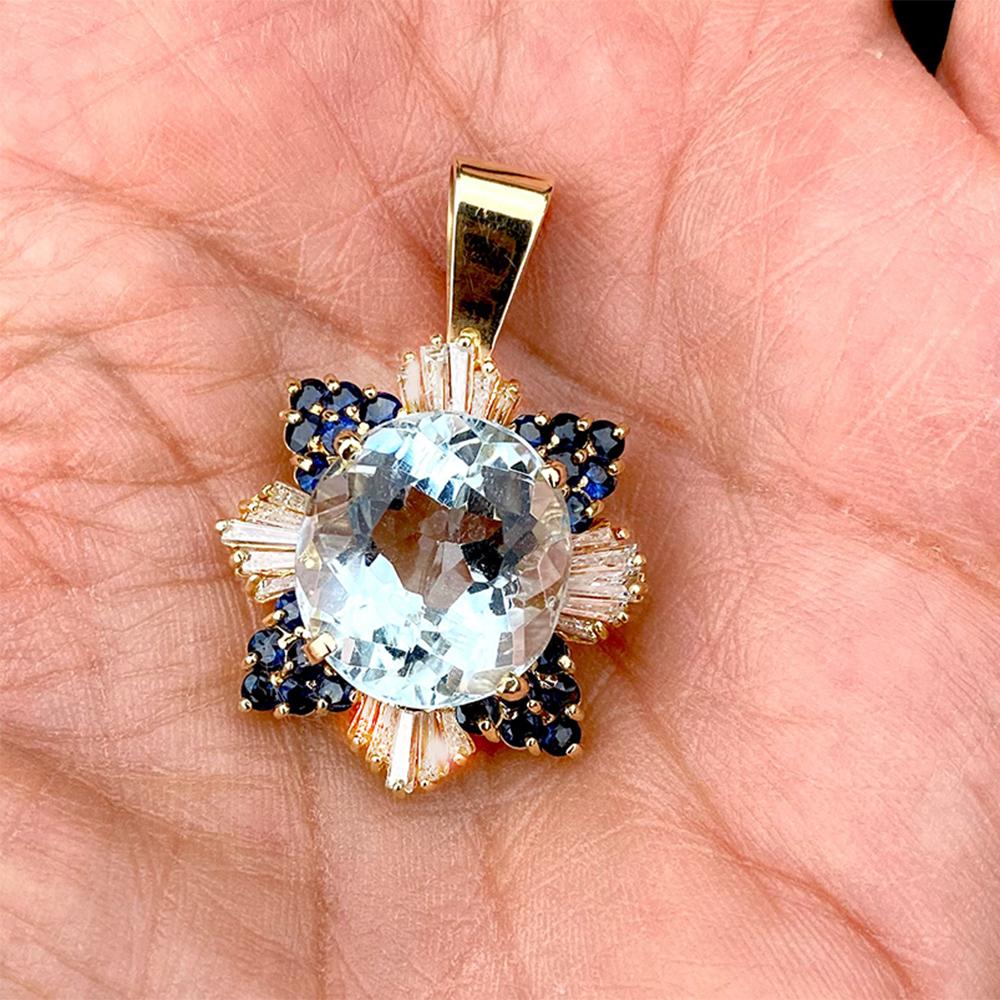 22.70 TCW Sapphire and Diamond Baguette Pendant with Oval Blue Topaz 14 Karat  In Excellent Condition For Sale In Laguna Hills, CA