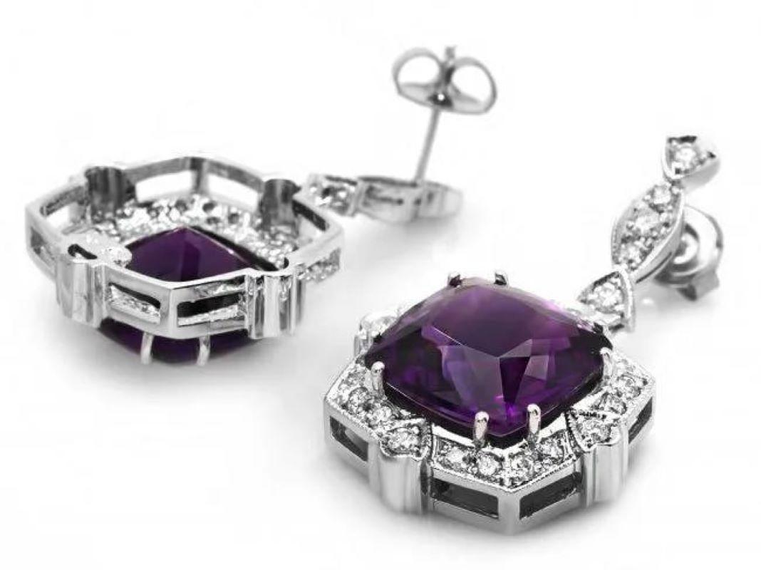 22.70ct Natural Amethyst and Diamond 14K Solid White Gold Earrings

Total Natural Cushion Amethyst Weight: 22.40 Carats 

Amethyst Measures: Approx.  14 x 14 mm

Total Natural Round Cut White Diamonds Weight: Approx.  0.30 Carats (color G-H /