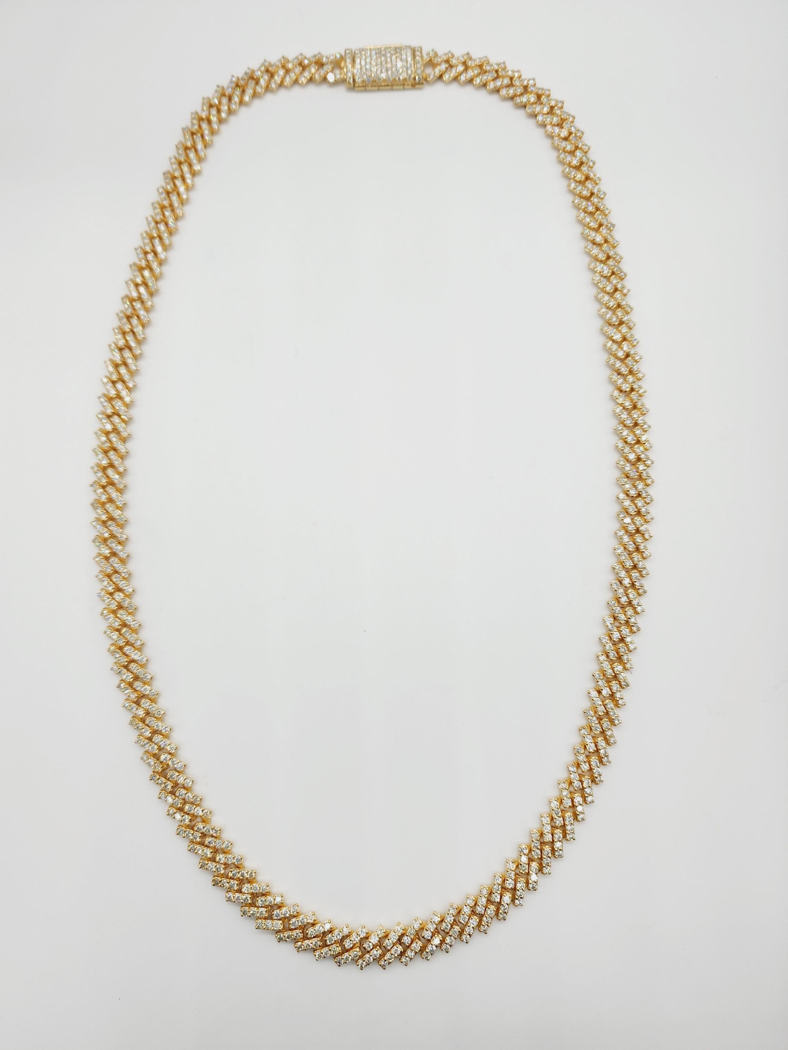 22.75 Carats Total Weight Heavy Gold Cuban Necklace Chain 14 Karats Yellow Gold
20 inch, 10 mm wide, Average Color H-I, Clarity SI,
105 Grams Solid Gold , all natural shiny diamonds.