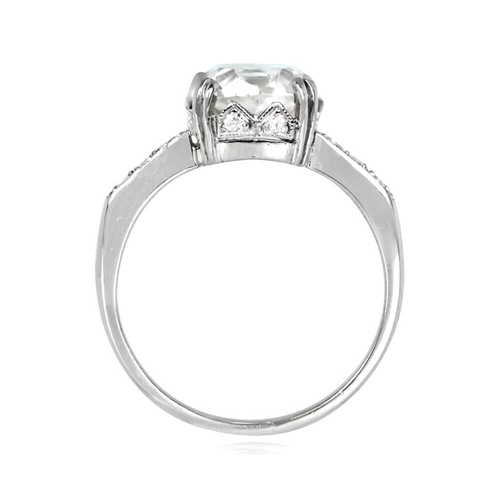 Indulge in the timeless beauty of this classic engagement ring. At its center lies a captivating 2.27-carat old European cut diamond, boasting a warm J color and impressive VS2 clarity, elegantly set in secure prongs. The diamond's brilliance and