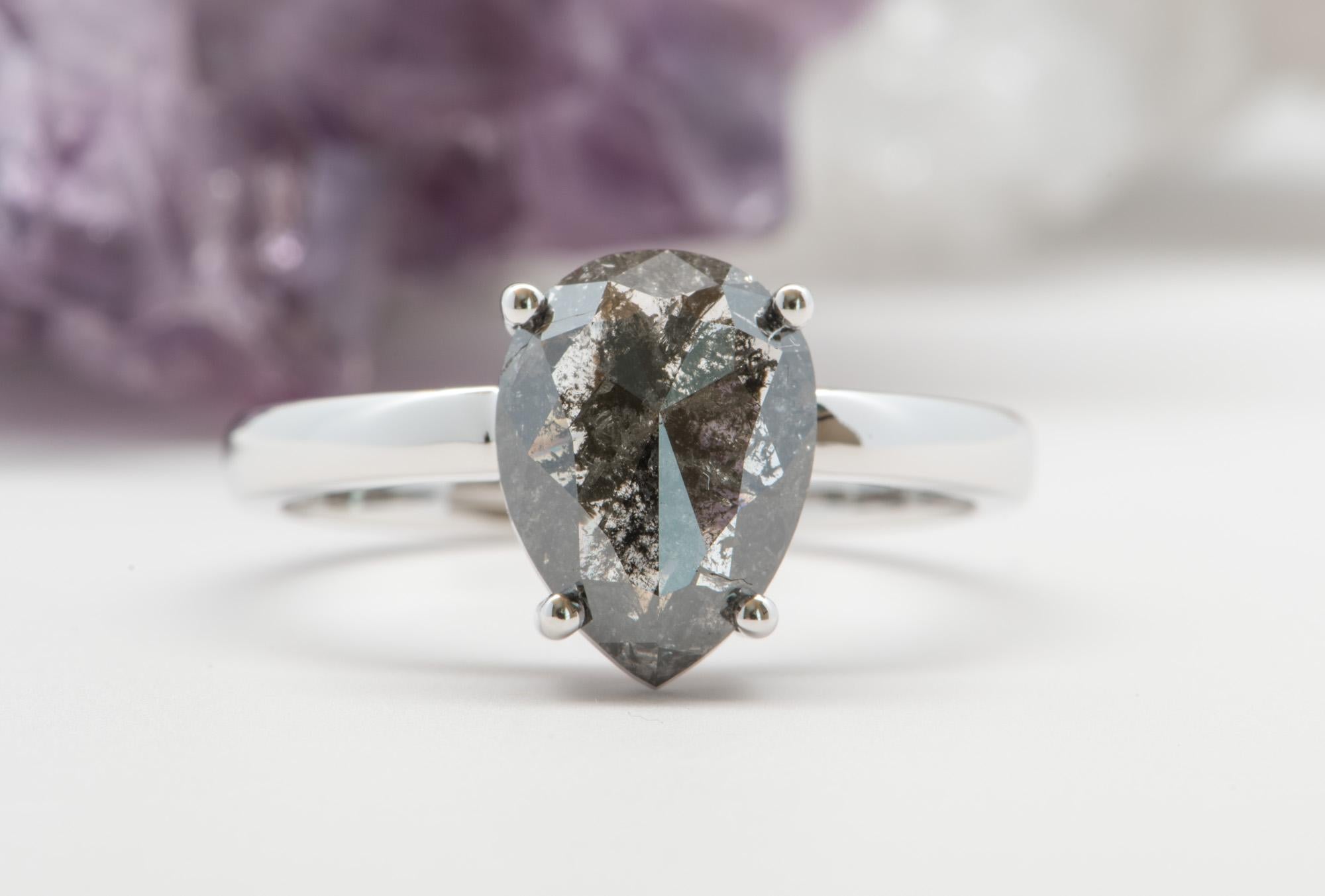 ♥  Solid 14K white gold ring set with a beautiful pear shape salt and pepper diamond in the center
♥  The overall setting measures 8.1mm in width, 11mm in length, and sits 5.1mm tall from the finger

♥  US Size 7.5 (Free resizing)
♥  Band width:
