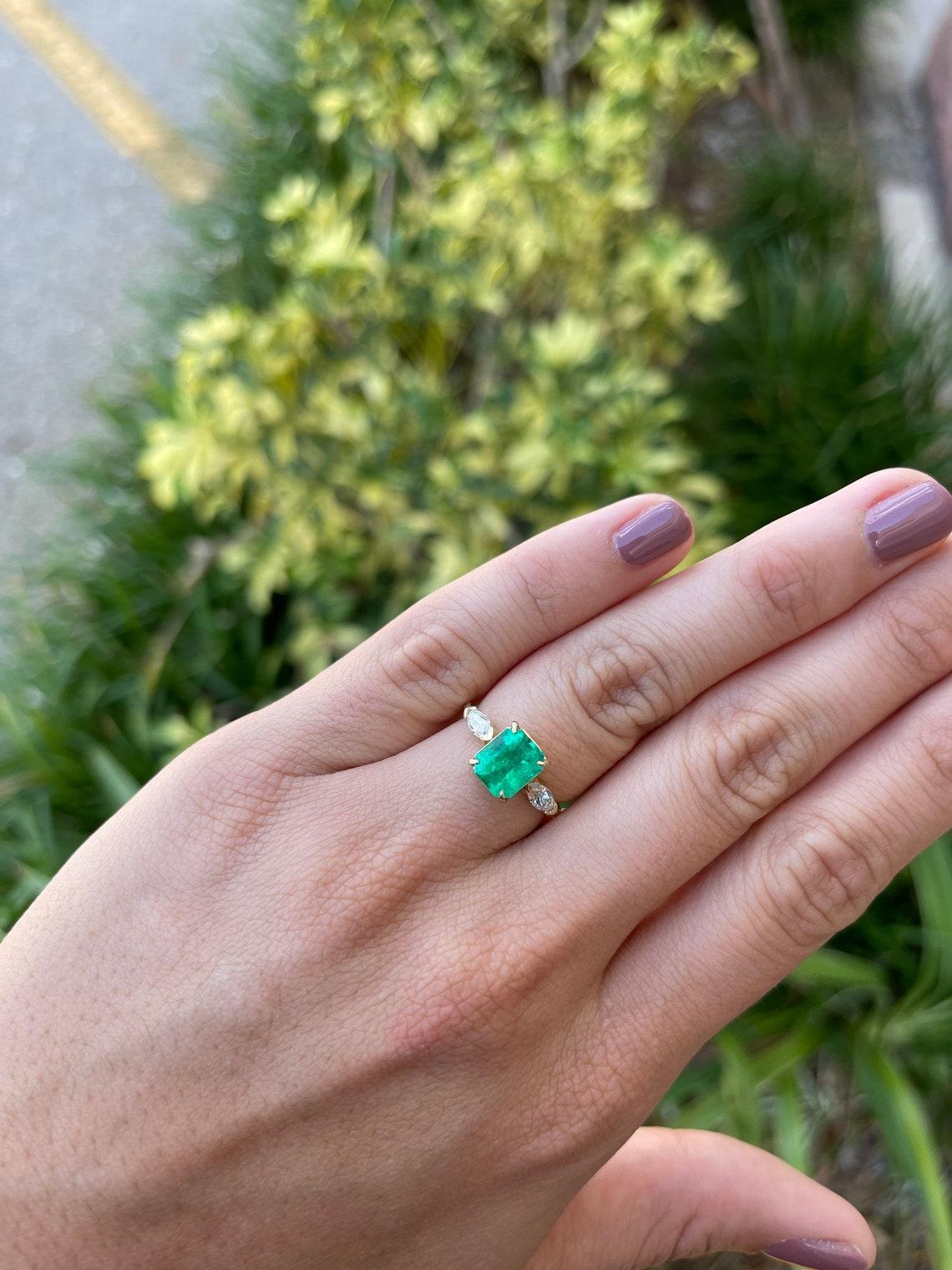 emerald marquise engagement ring