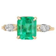 2.27tcw 18K Three Stone Emerald & Marquise Diamond Ring
