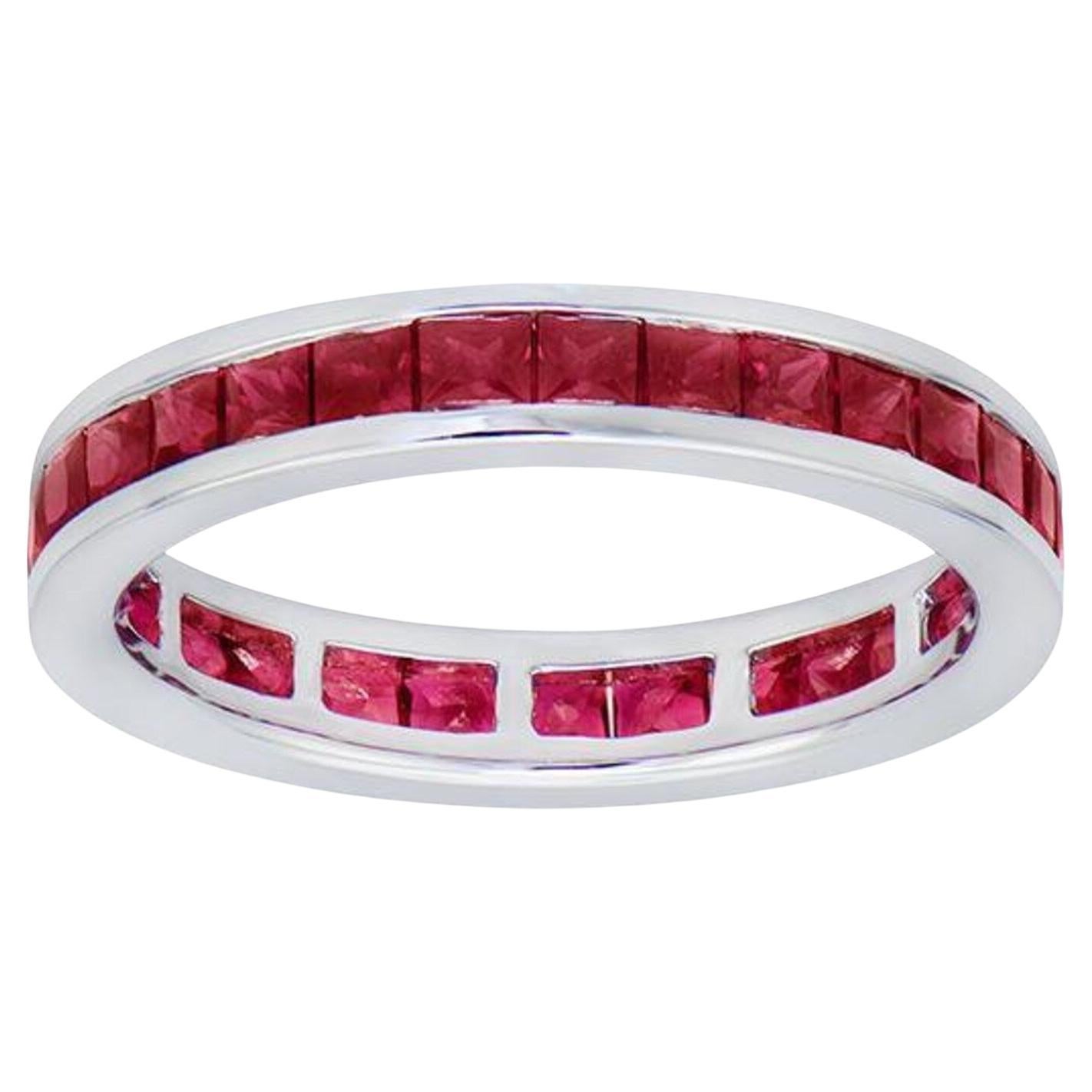 2.28 Carat Channel Set Ruby Band in 18K White Gold

This unique ruby band features elegant rubies in a simple channel setting that allows their beauty to be the focus. This ring is handcrafted in New York City by our expert jewelers.
-18K White