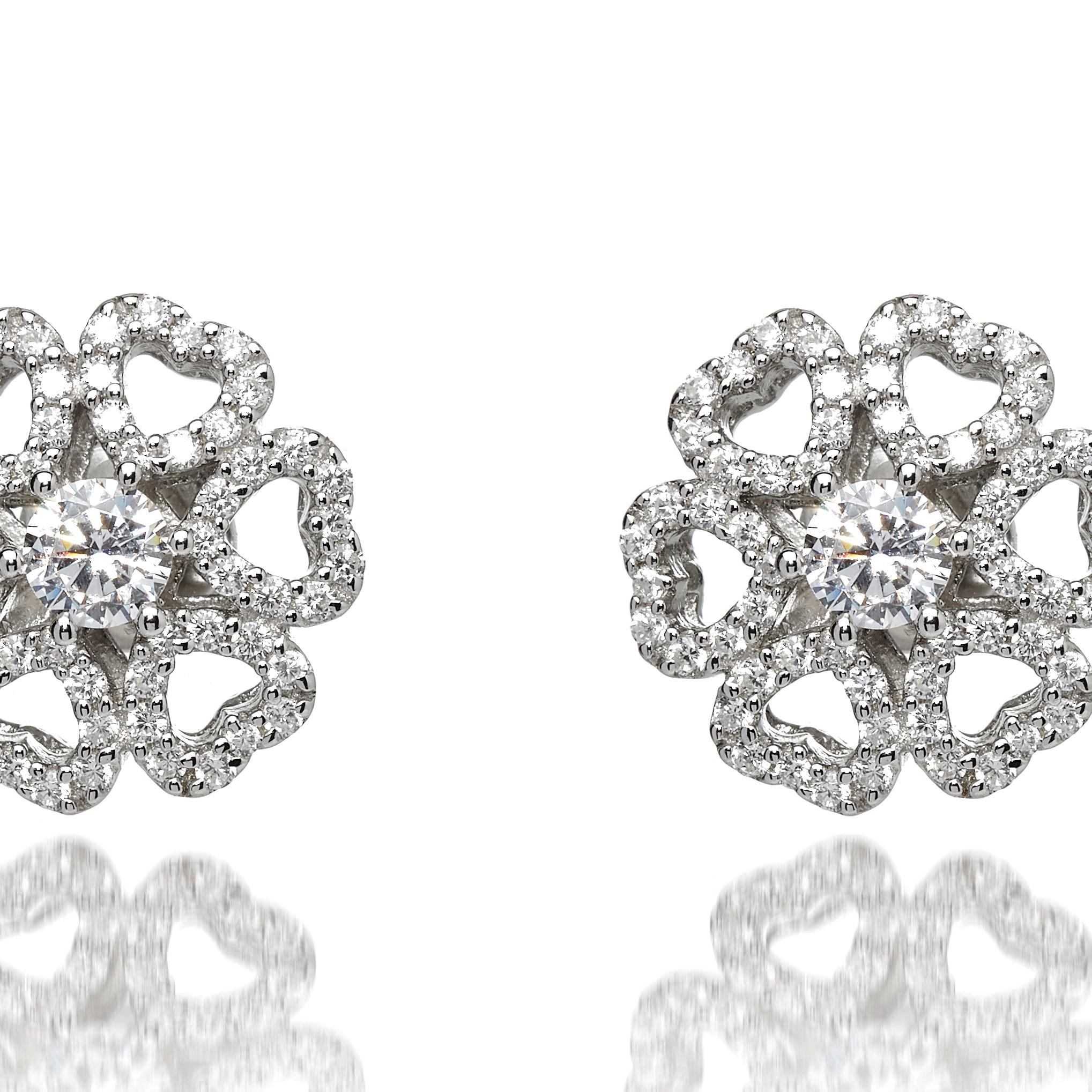 A delicate, feminine pair of stud earrings from our Floral collection. Made to the highest quality standards, these opulent statement studs are sure to leave a lasting impression.

Composed of 925 sterling silver  with a high gloss white rhodium