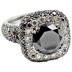 2.28 Carat Deep Blue Sapphire Platinum Ring with Diamonds and Black Sapphires