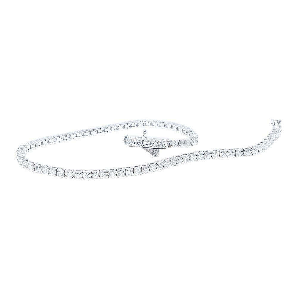 14k white gold bracelet containing 2.28 carats of prong set diamonds. The color and clarity grades of the diamonds contained within the bracelet are E-F, VS1-SI1, respectively. The average polish, symmetry, and cut grade for each of these diamonds