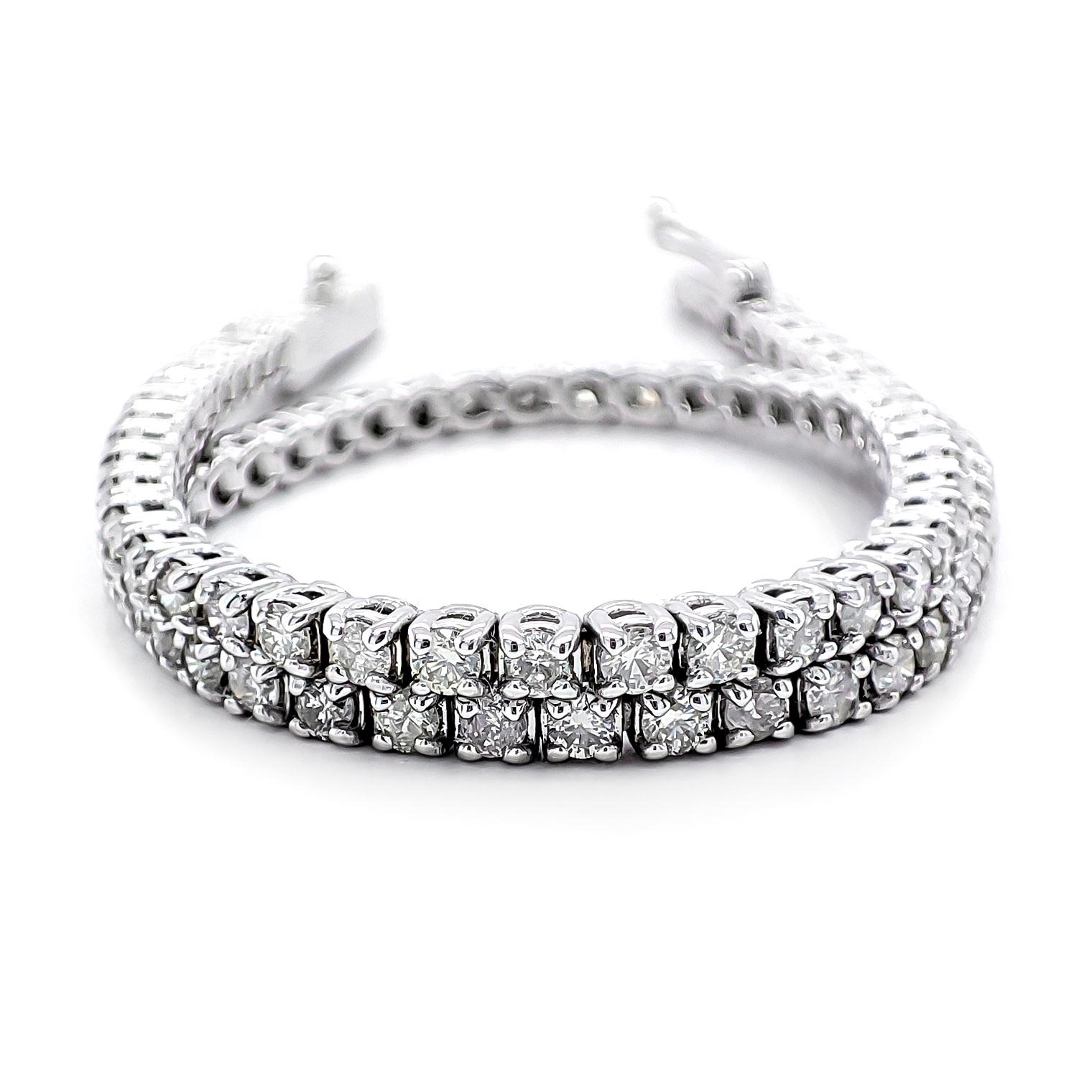 FOR CUSTOMERS FROM THE USA NO VAT

This stunning bracelet is adorned with 83 natural round brilliant diamonds, totaling 2.28 carats, featuring a color range of F to I and clarity between VS and SI. Crafted in 14 kt white gold, stamped 585, the
