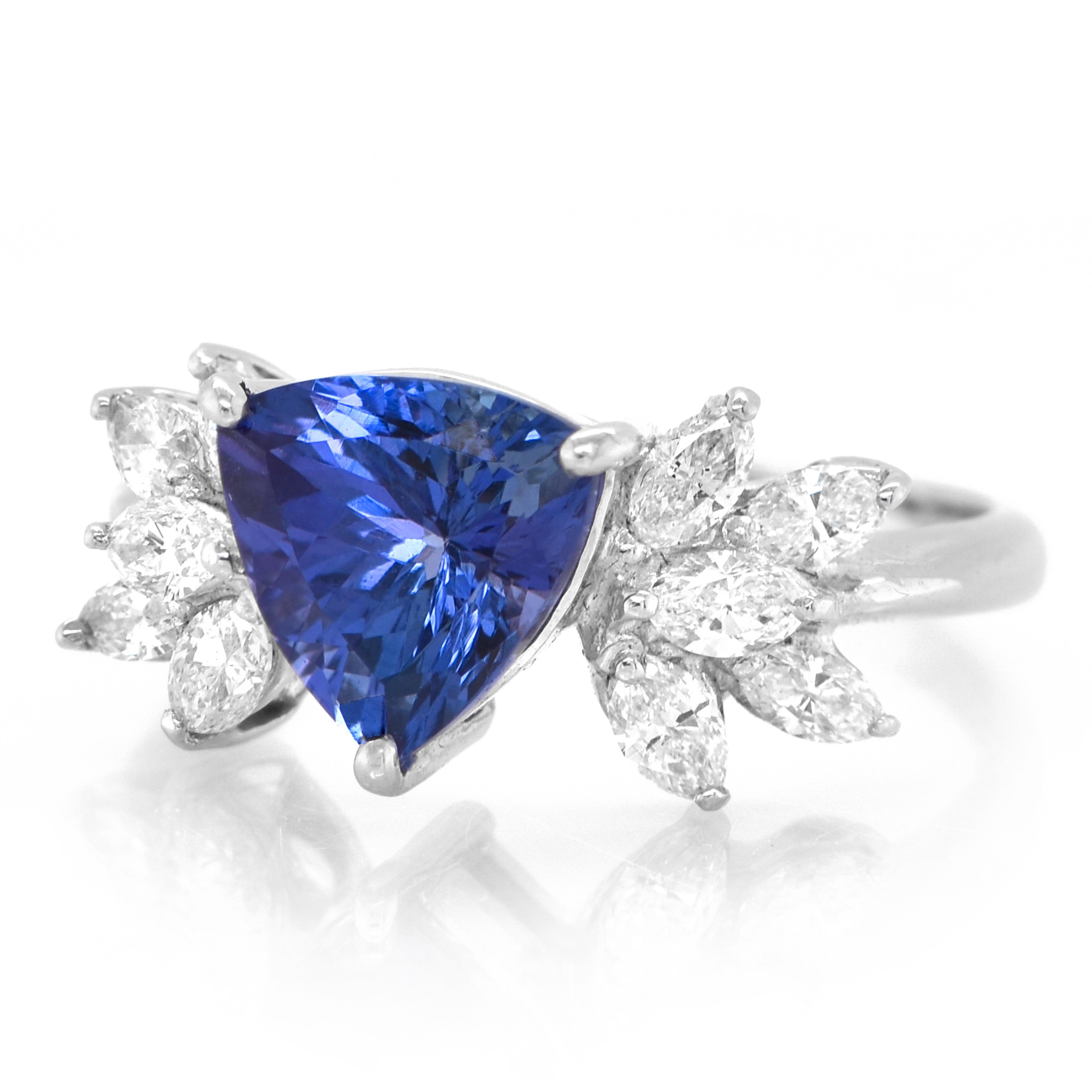 A beautiful ring featuring a 2.28 Carat Natural Tanzanite and 0.60 Carats of Diamond Accents set in Platinum. Tanzanite's name was given by Tiffany and Co after its only known source: Tanzania. Tanzanite displays beautiful pleochroic colors meaning