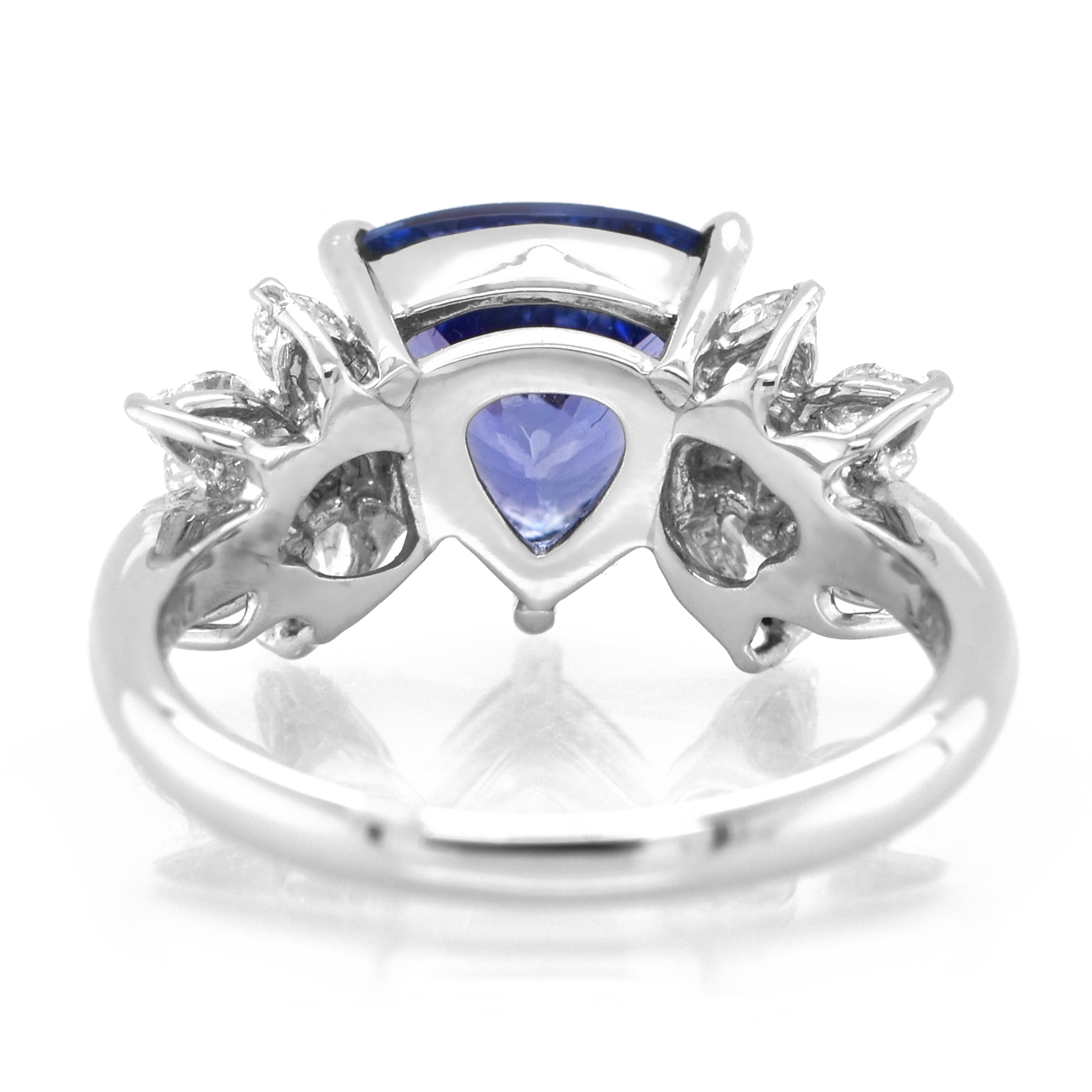 2.28 Carat Natural Trillion-Cut Tanzanite and Diamond Ring Set in Platinum In New Condition In Tokyo, JP