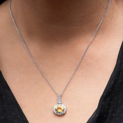 2.28 Carat Oval Golden Beryl Pendant Necklace with 0.69 Carat Round Diamonds