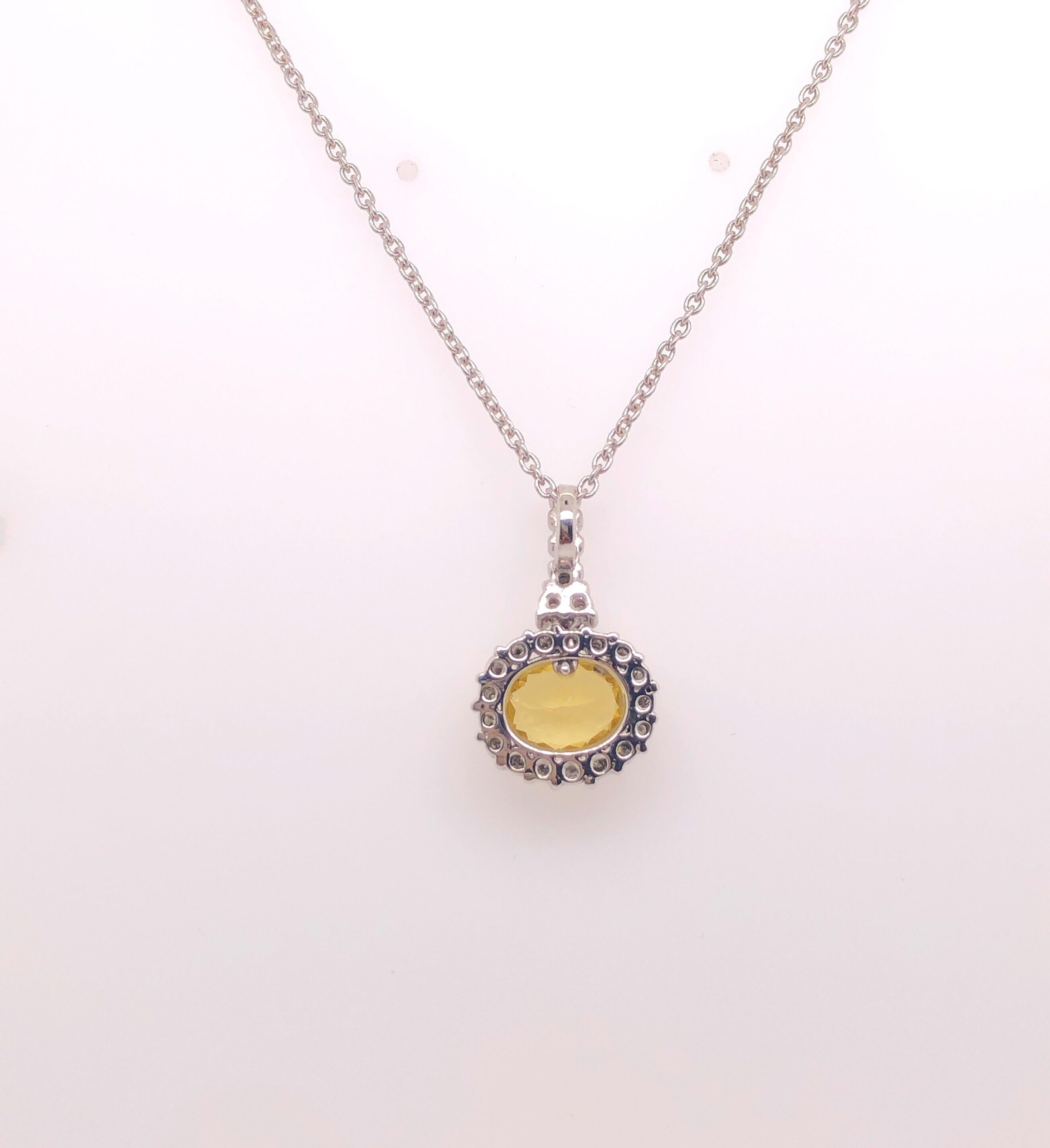Oval Cut 2.28 Carat Oval Golden Beryl Pendant Necklace with 0.69 Carat Round Diamonds For Sale