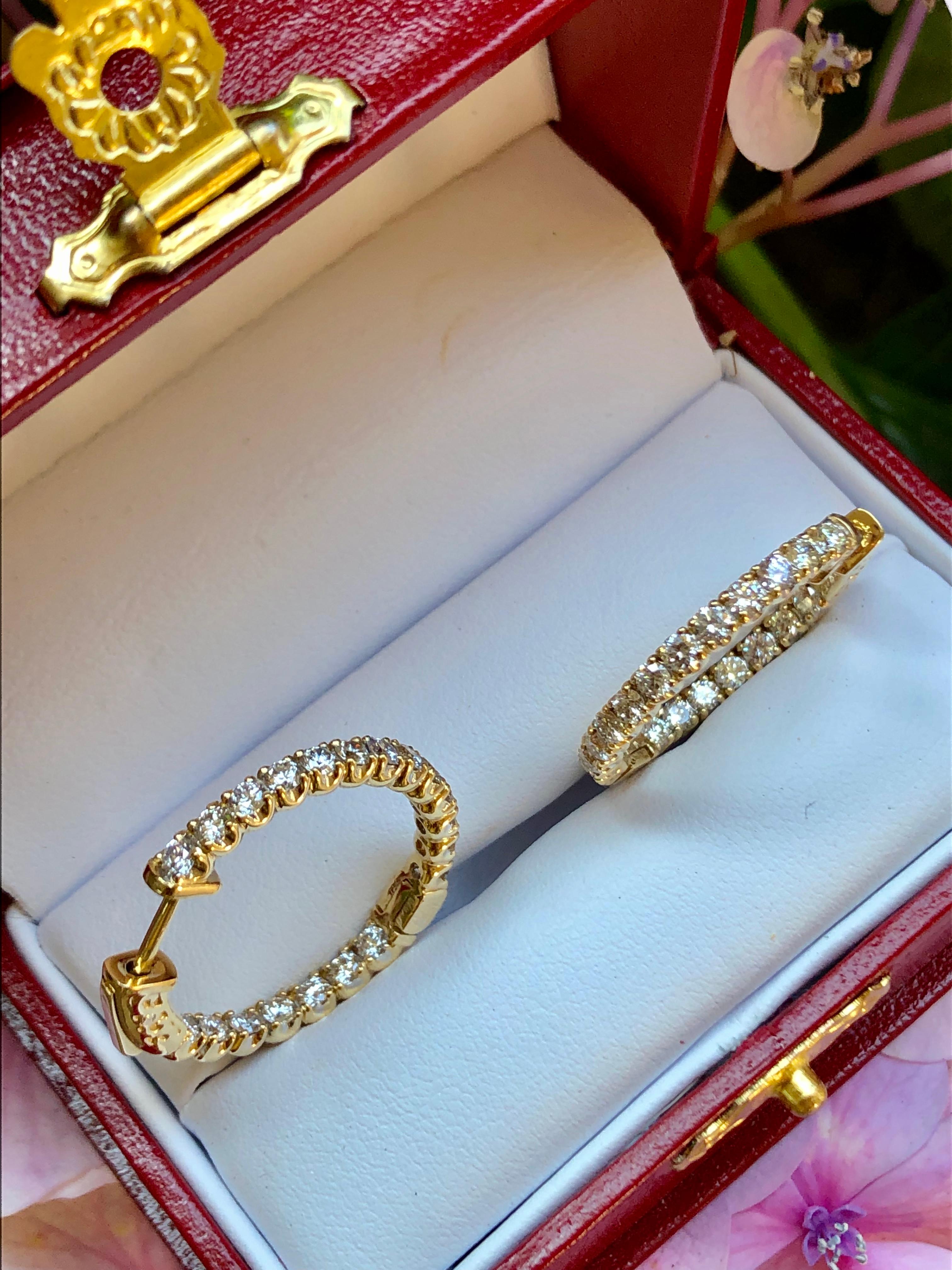 The epitome of understated elegance, these inside/outside earrings feature 38 sparking round brilliant white diamonds “U” set in 14 karat yellow gold, with all the diamonds facing forward.  So wearable they will become your favorite pair, these