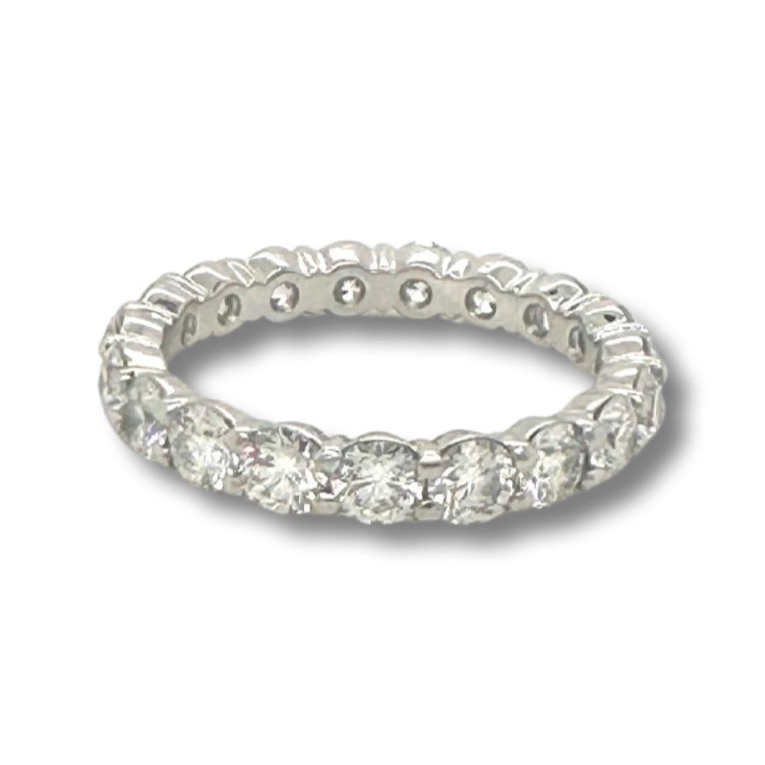 Style: Eternity Ring

Metal: Platinum

Stones: 19 Round Diamonds

Diamond Carat Weight: approx. 2.28 ct

Diamond Clarity: VS1 - VS2

Diamond Color: E - F

Ring Size: 6.25

Total Weight (grams): 4.3

Includes: Brilliance Jewels 2 Year Warranty

     