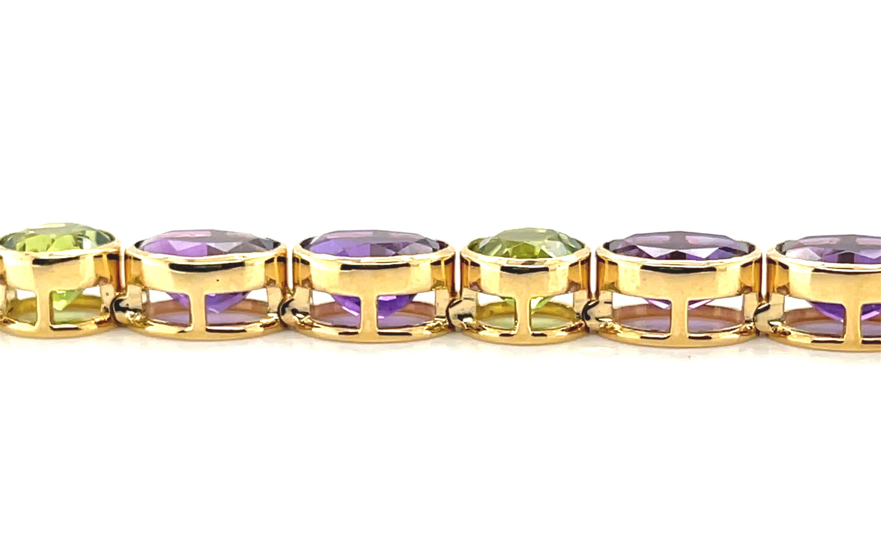 Artisan Amethyst and Peridot Yellow Gold Bezel Set Tennis Bracelet For Sale