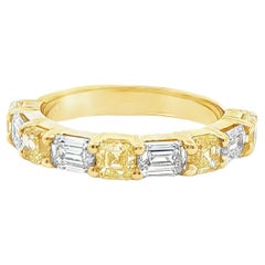 2.28CTW Fancy Intense Yellow Diamond 
Emerald Cut Diamond Ring in 18K Gold