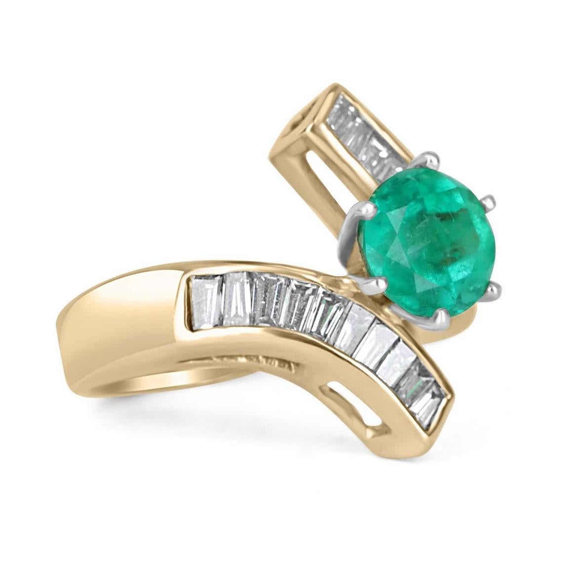 Displayed is a spectacular round Colombian emerald and diamond baguette cocktail ring 14K. Set in 14k yellow gold, the sublime emerald weigh a perfect 1.50-carats and is set alongside brilliant white baguette diamonds in an elegant bypass channel