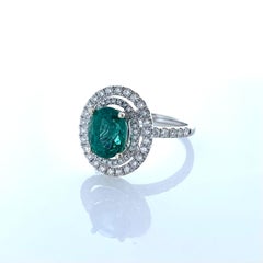 2.29 Carat Emerald Oval in Double Halo Diamond Ring in 18K White Gold