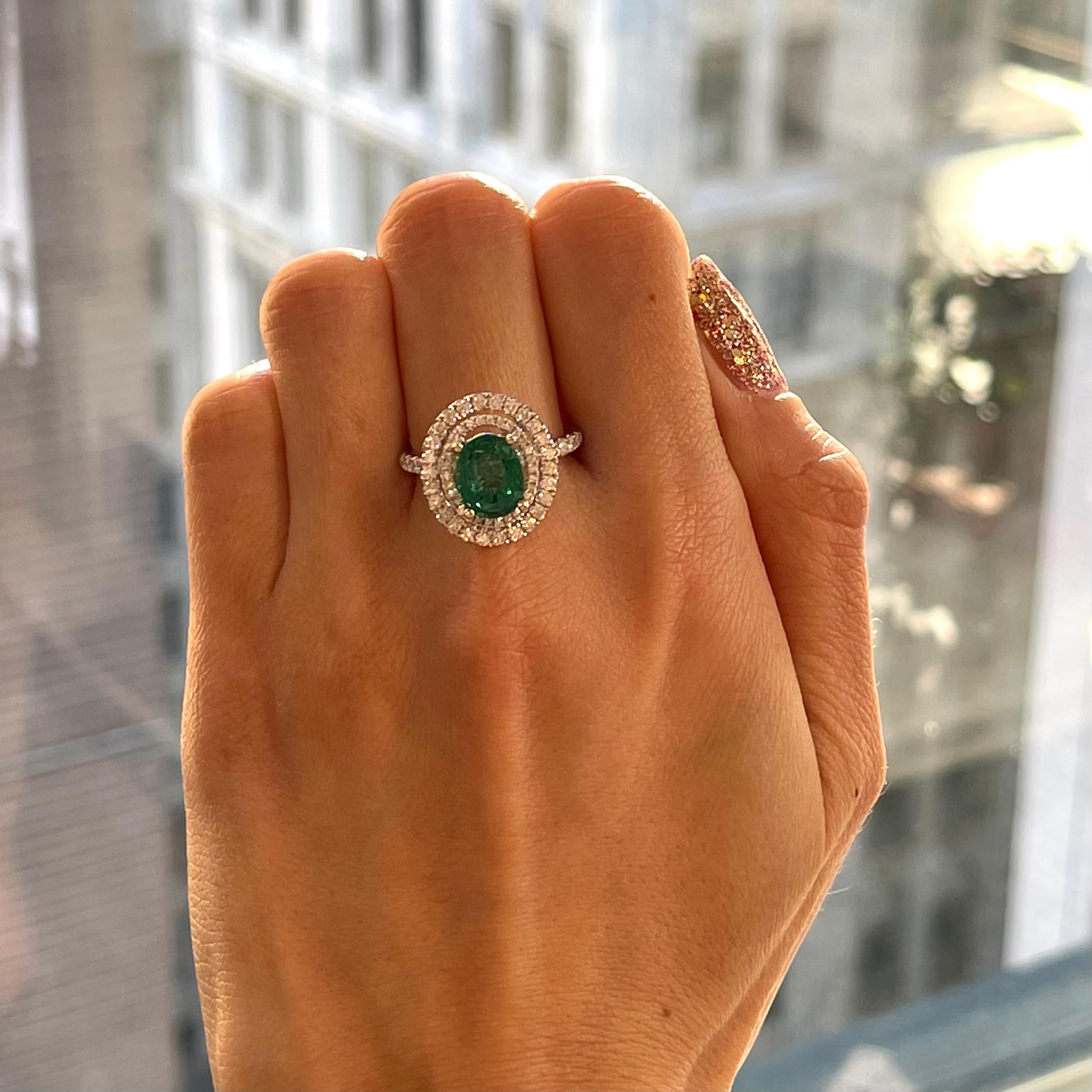 Contemporary 2.29 Carat Emerald Oval in Double Halo Diamond Ring in 18K White Gold For Sale