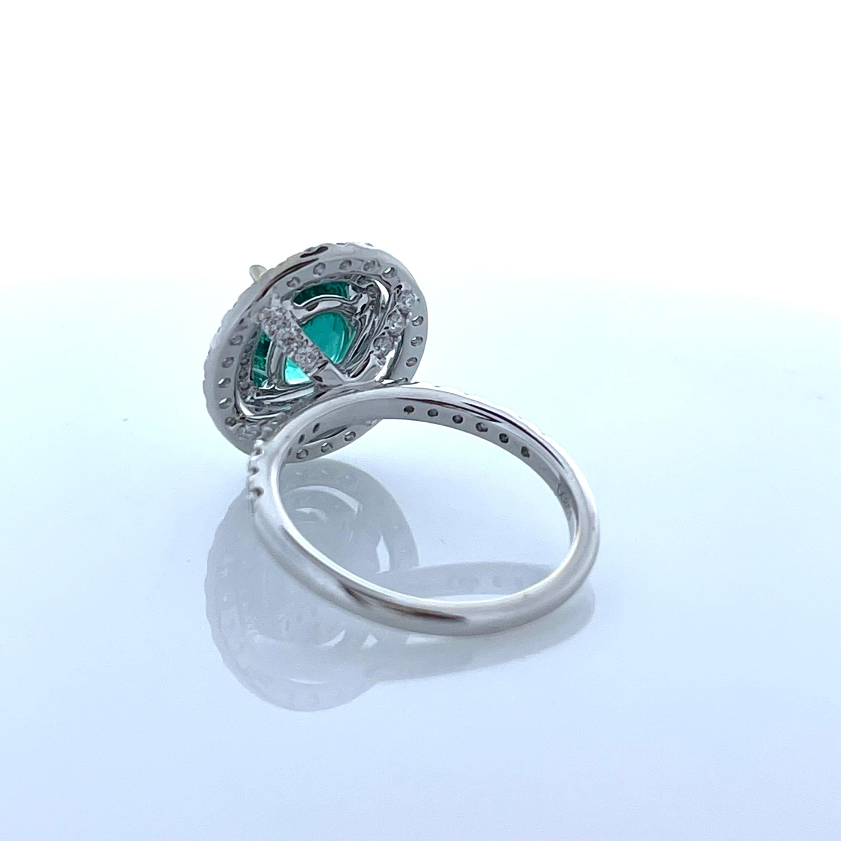 Oval Cut 2.29 Carat Emerald Oval in Double Halo Diamond Ring in 18K White Gold For Sale