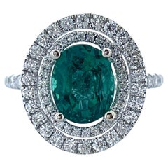 2.29 Carat Emerald Oval in Double Halo Diamond Ring in 18K White Gold