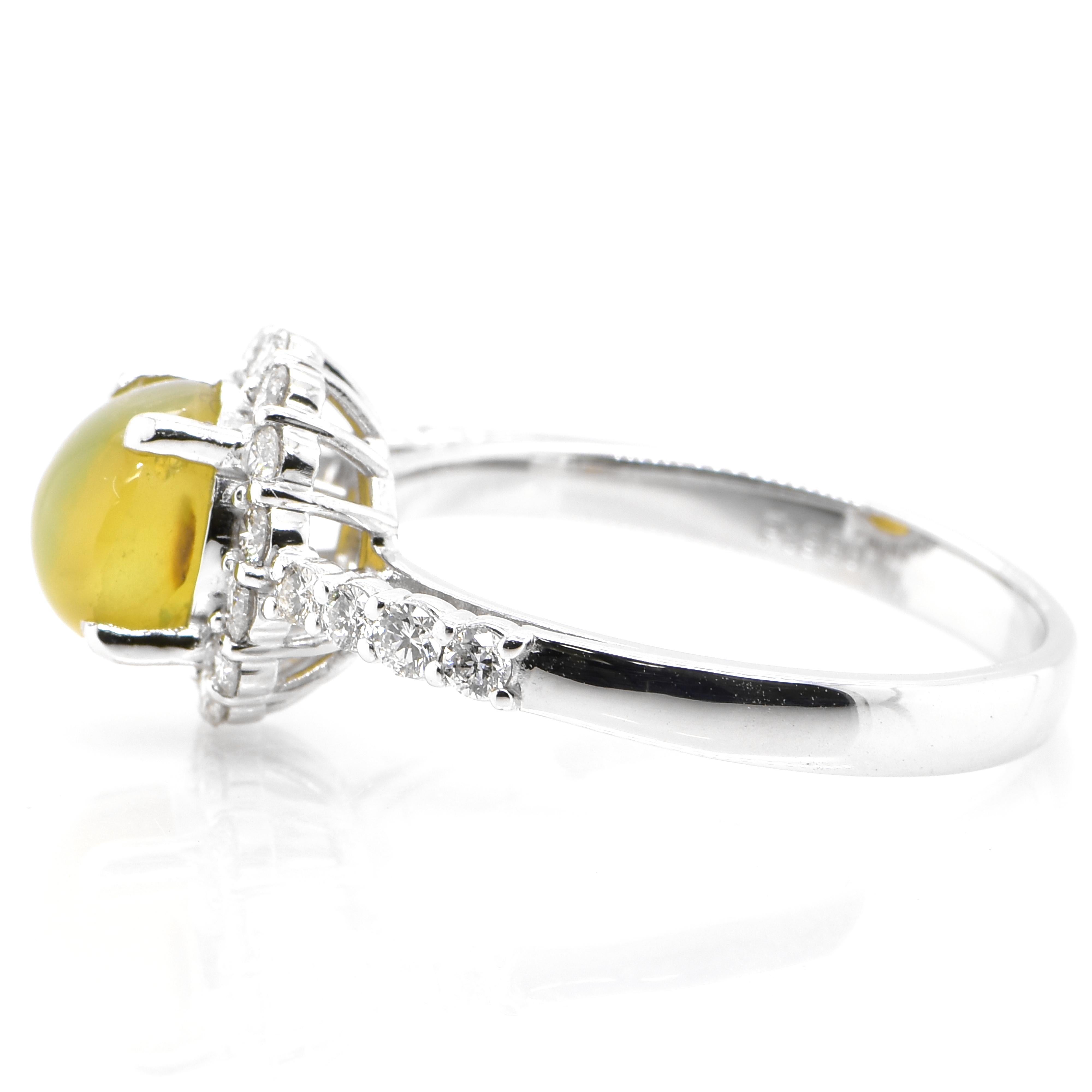 Cabochon 2.29 Carat 'Honey-Color' Cat's Eye Chrysoberyl and Diamond Ring Set in Platinum For Sale