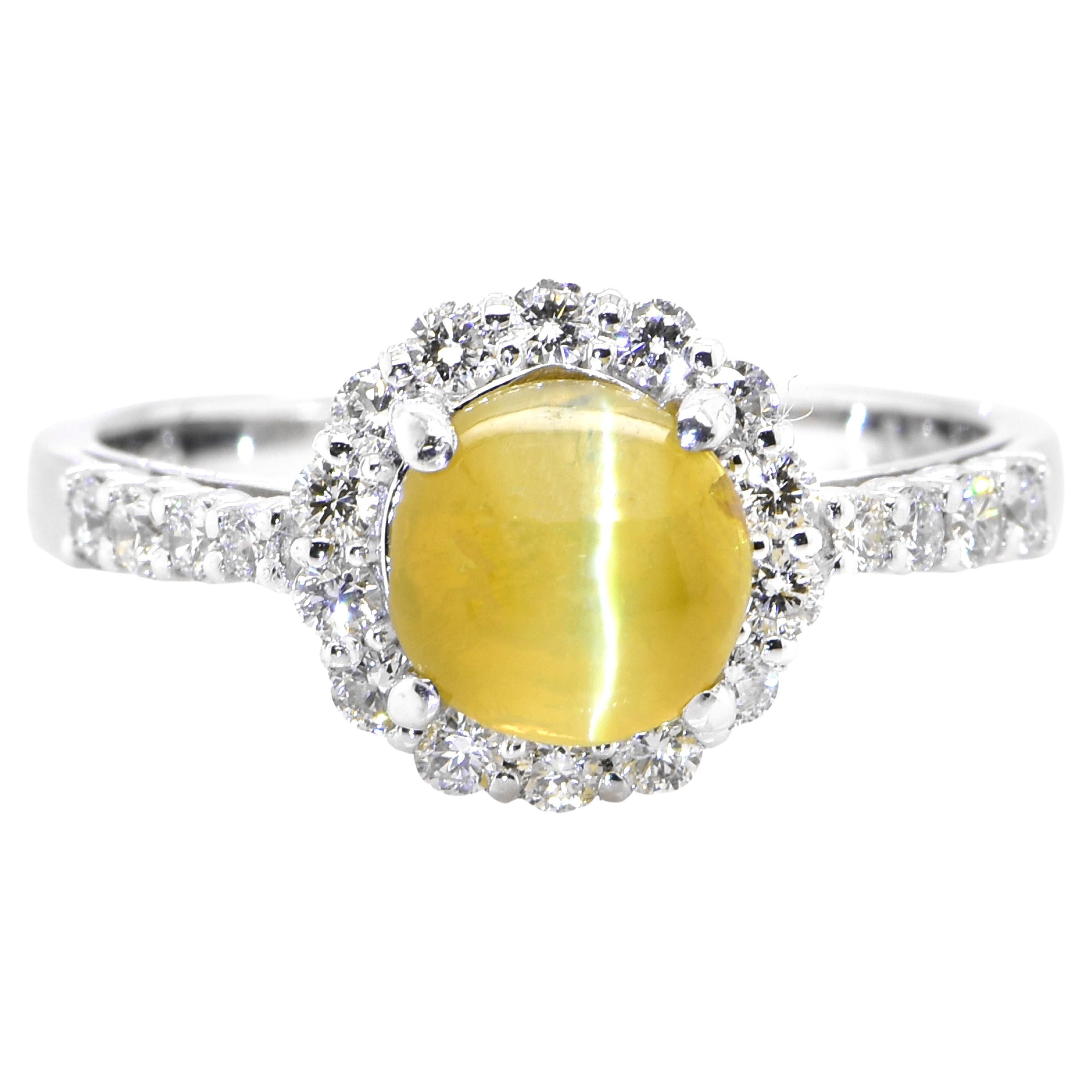 2.29 Carat 'Honey-Color' Cat's Eye Chrysoberyl and Diamond Ring Set in Platinum For Sale
