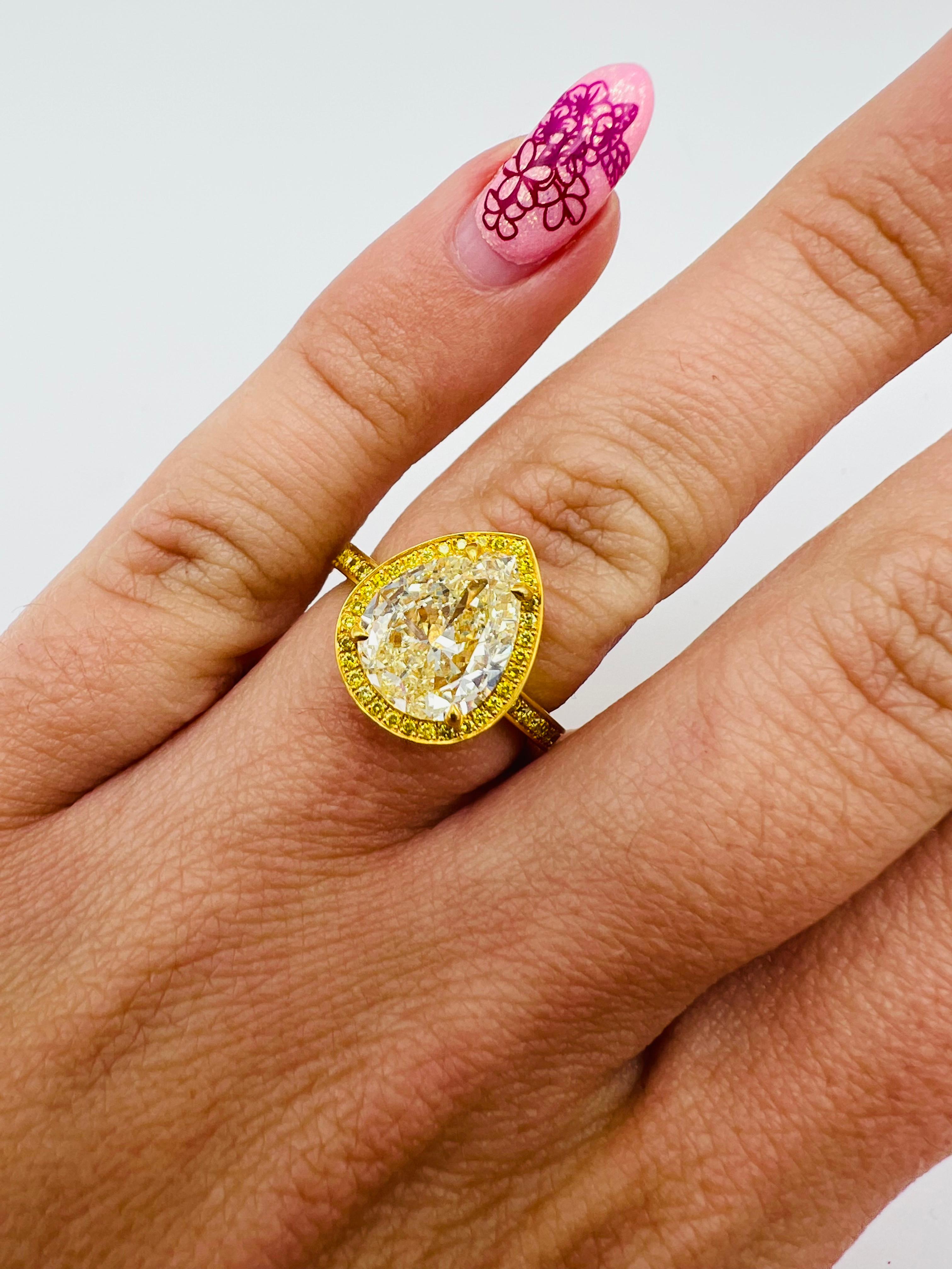 2.29 Carat Light Fancy Yellow Pear Shape Diamond Engagement Ring For Sale 5