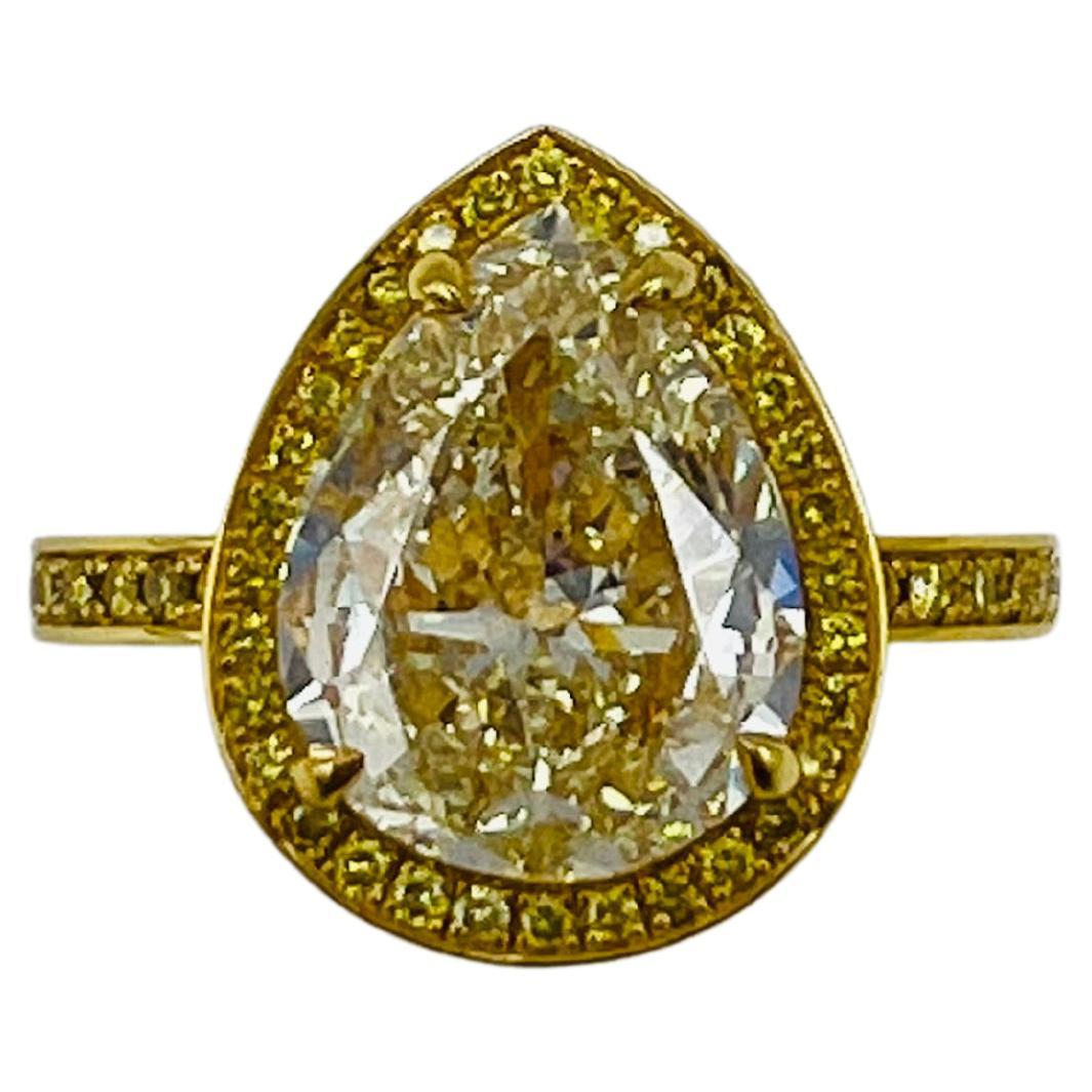 2.29 Carat Light Fancy Yellow Pear Shape Diamond Engagement Ring For Sale