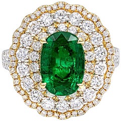 2.09 Carat Diamond and 2.29 Carat Oval Cut Emerald Magnificent Cocktail Ring 