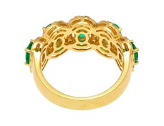 2.29 Carat Oval Cut Emerald and Diamond Wedding Band in 18K Gold