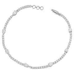 Bracelet empilable de type « tennis » orné de diamants naturels en forme de poire d'un poids total de 2,29 carats, en or blanc 14 carats