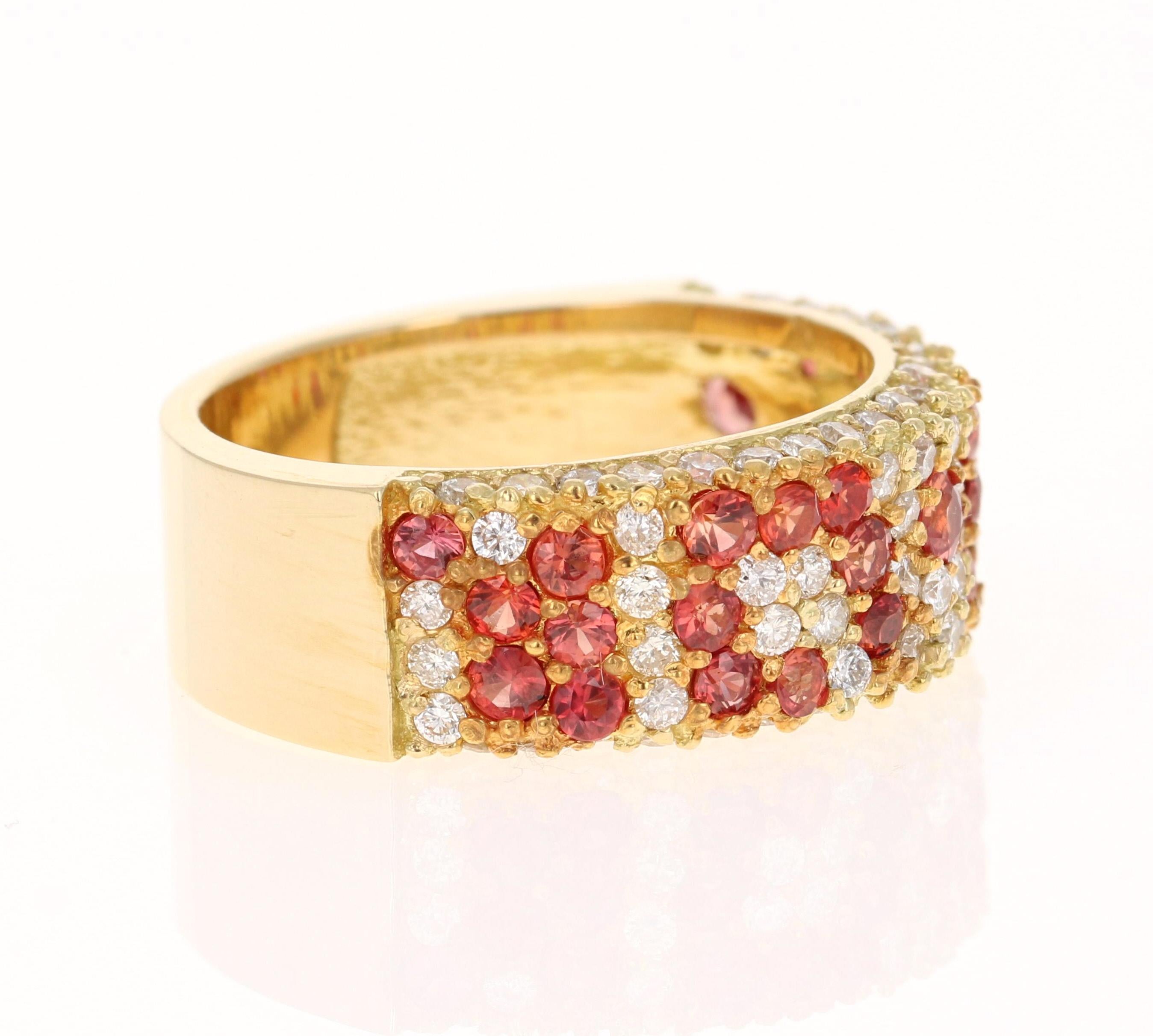 This band has 31 Red Sapphires that weigh 1.30 carats and 81 Round Cut Diamonds that weigh 0.99 carats. (Clarity: SI, Color: F) The total carat weight of the ring is 2.29 carats. 

The ring is designed in 18 Karat Yellow Gold and weighs