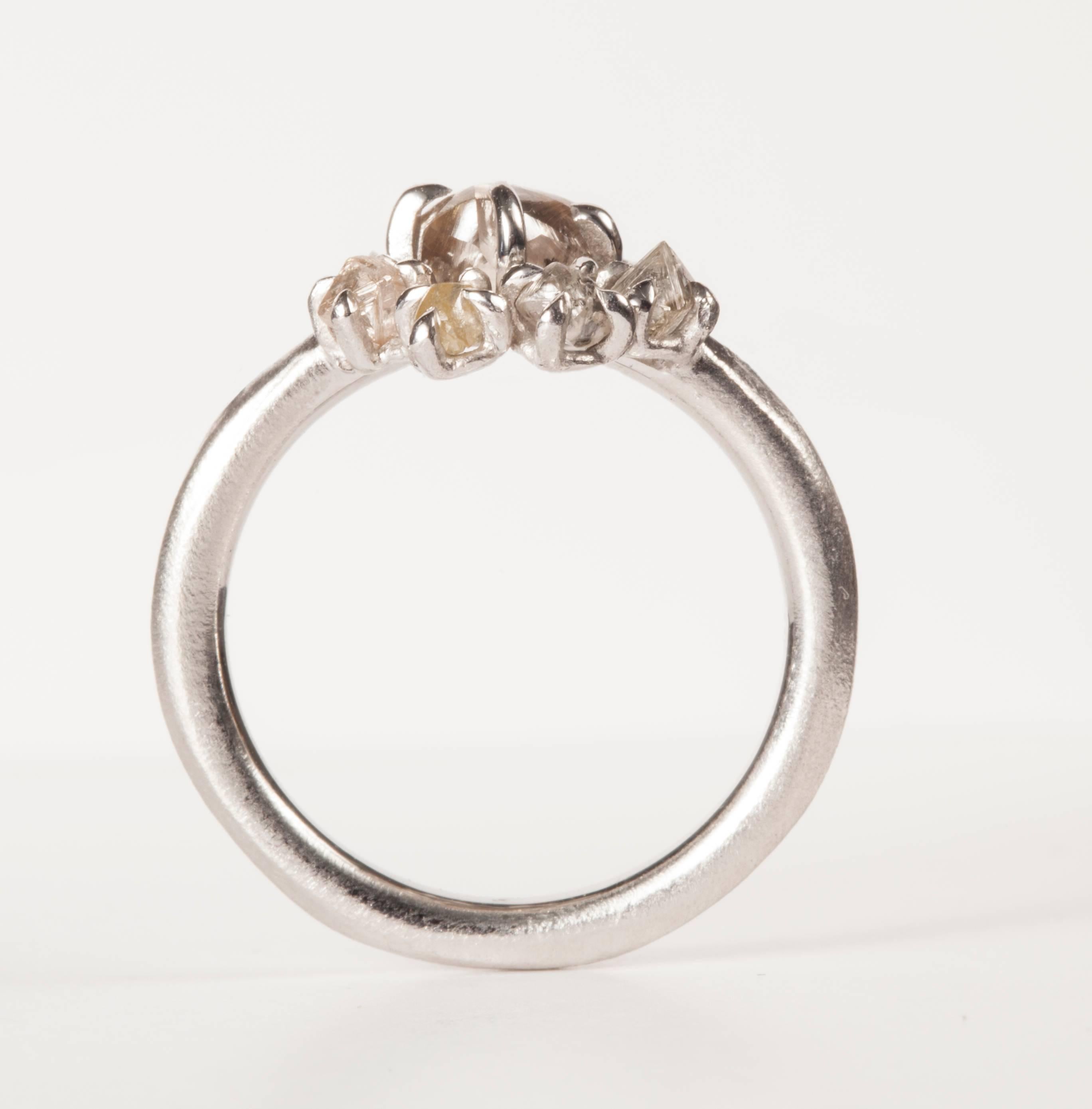 1.06 ct. Natural Light Brown and 1.23 ct. Natural Whitish Rough diamonds in 14K handcrafted white gold ring.

Every rough diamond from Roughdiamonds dk has been personally handpicked by Maya Bjørnsten. The diamonds we reject are sent back to be cut