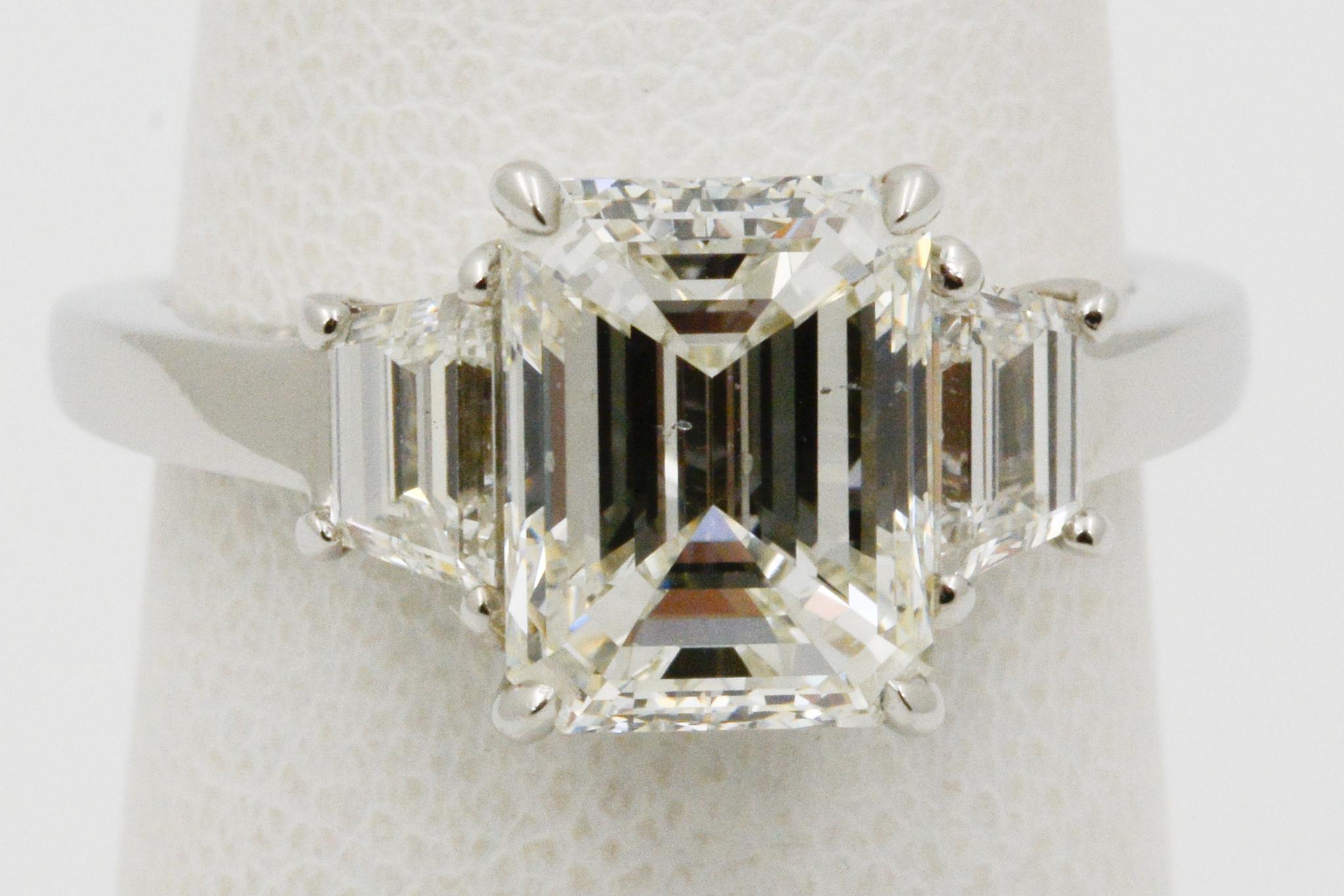 Emerald Cut 2.29 Carat Three-Stone Platinum Diamond