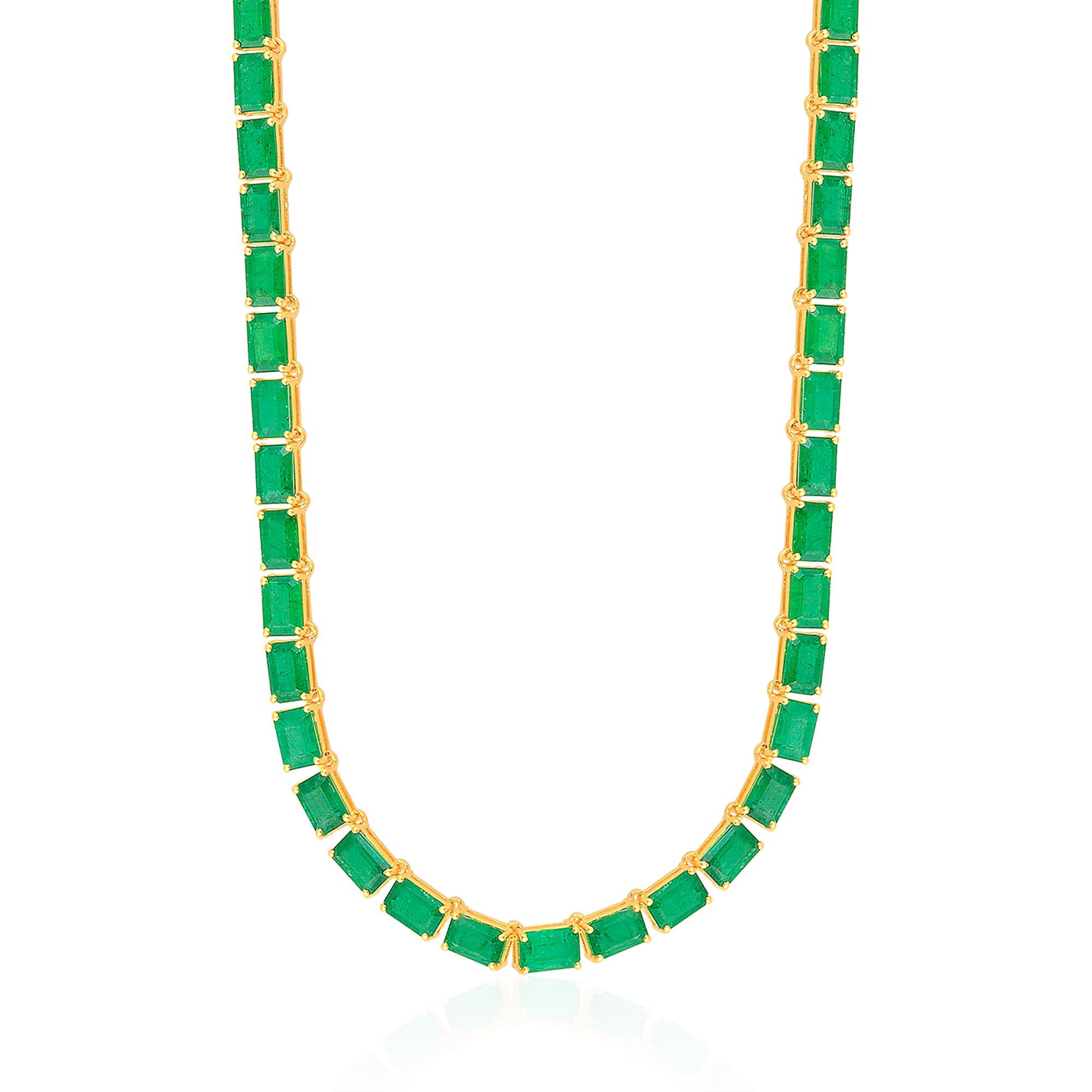 Crafted with meticulous attention to detail, this necklace showcases exquisite craftsmanship and a commitment to excellence. The 14k yellow gold setting provides a warm and luxurious backdrop for the emeralds, enhancing their color and creating a
