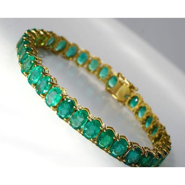 Emerald Weight: 22.90 ct, Measurements: 7x5 mm (34 pcs), Metal: 18K Yellow Gold, Gold Weight: 17.60 gm, Birthstone: May, Origin: Zambia