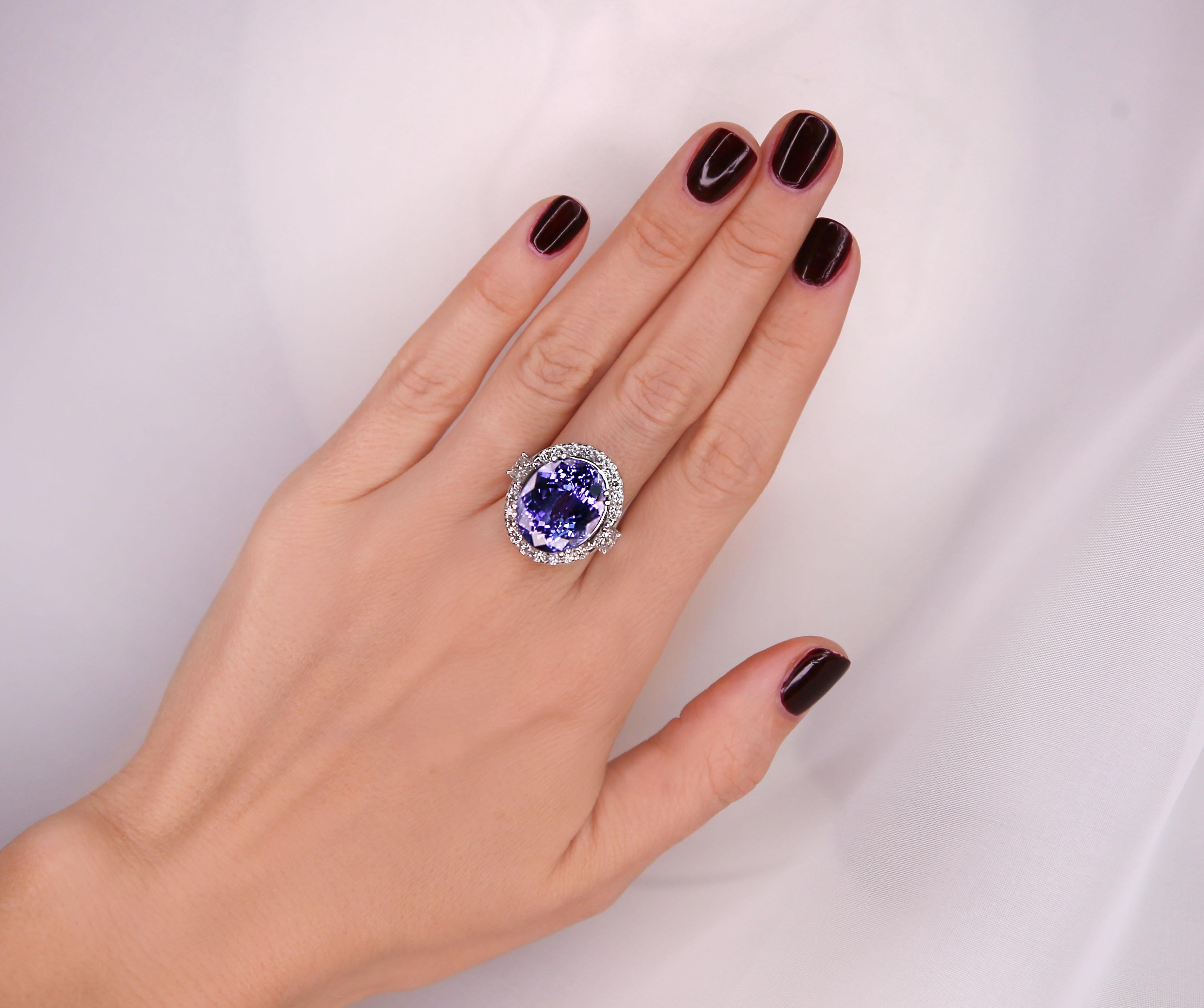 Item Type: Ring

Item Style: Cocktail

Material: 18K White Gold

Mainstone: Tanzanite

Stone Color: Blue

Stone Weight: 21.62 Carat

Stone Shape: Oval
Stone Quantity: 1

Stone Dimensions: 18.22x14.83 mm

Stone Creation Method: Natural

Stone