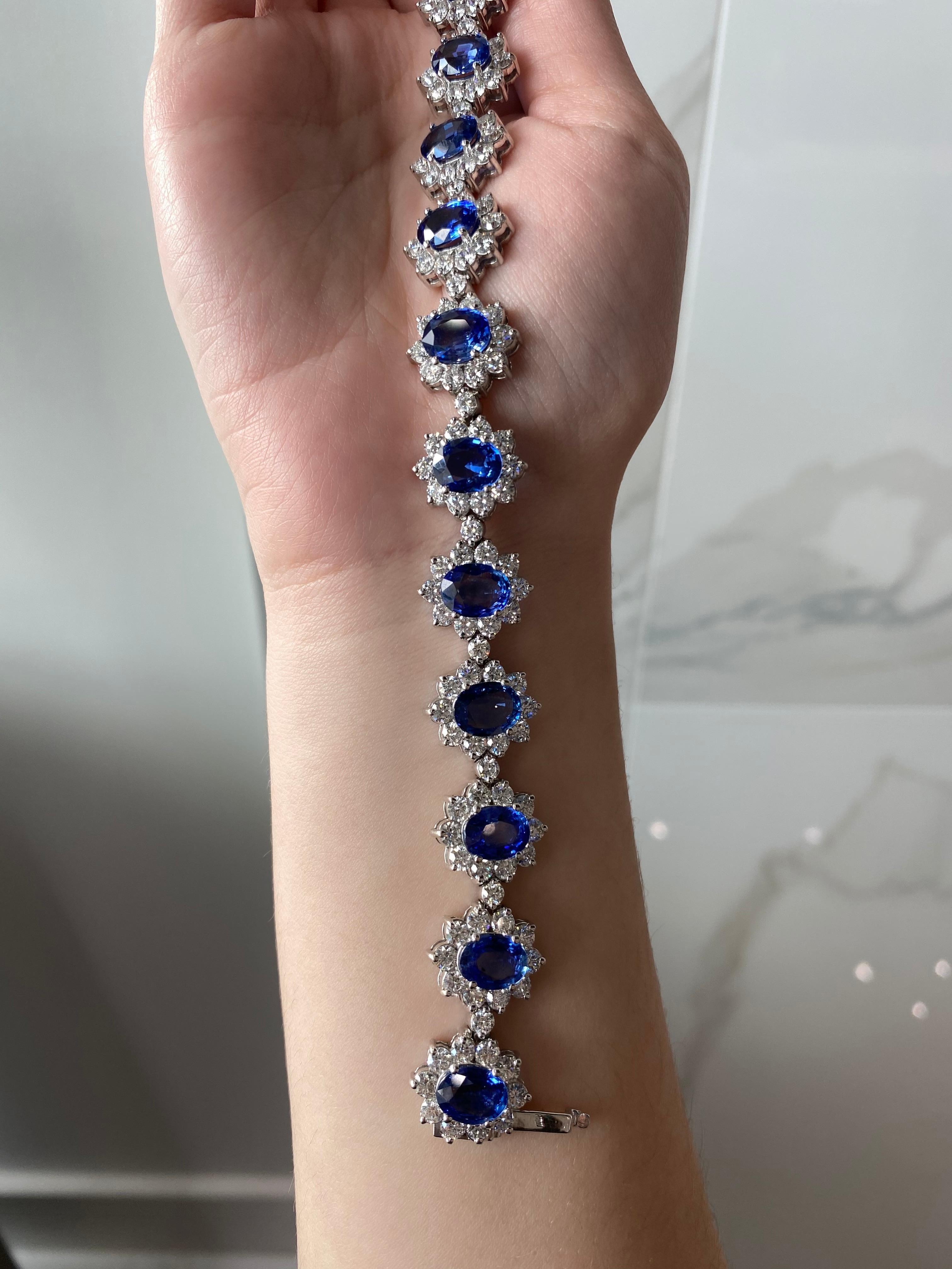 22.96 Carat Oval Blue Sapphire and 13.47ctw Round Diamond Halo Floral Bracelet In New Condition In Houston, TX