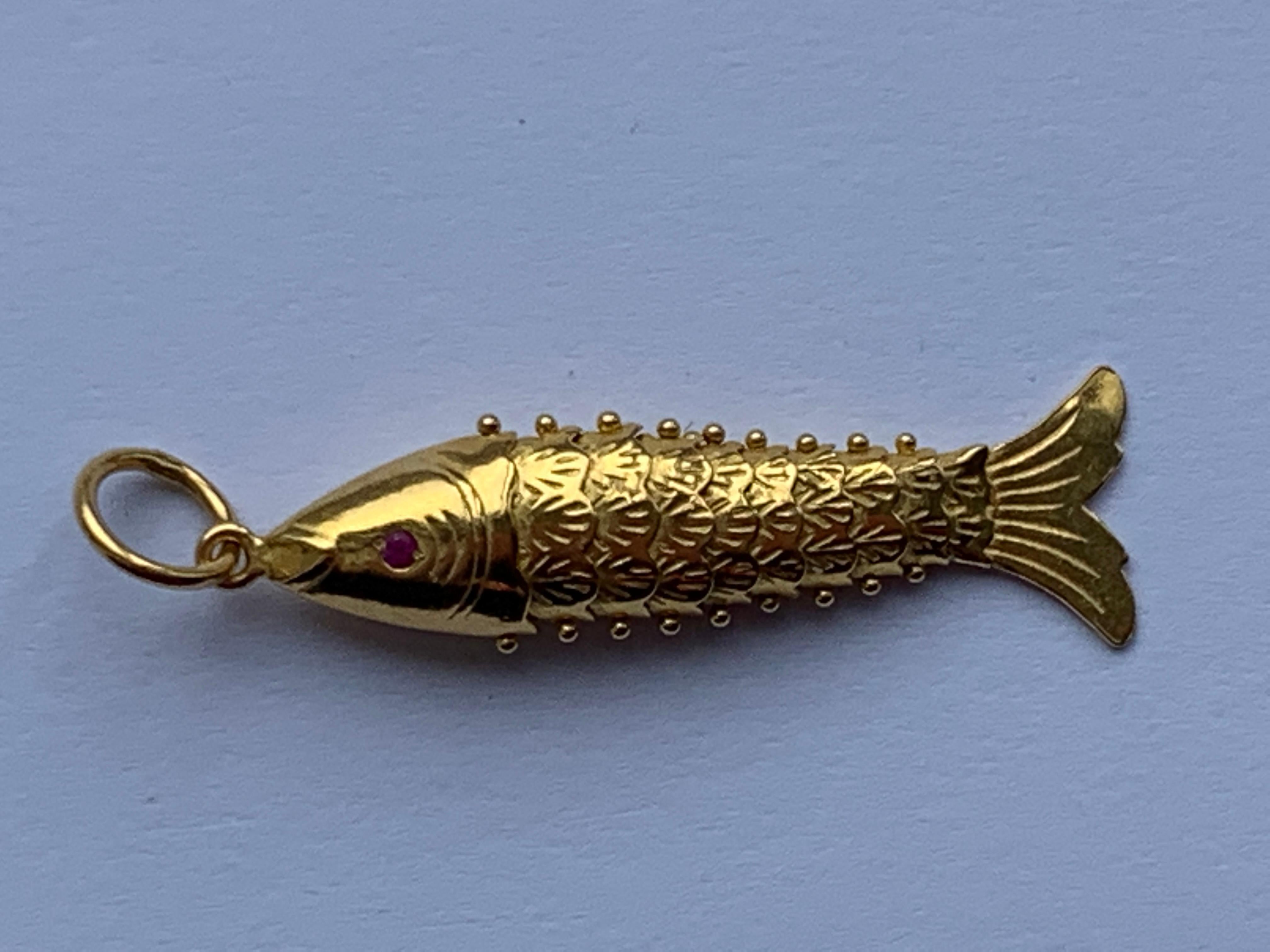 articulated fish pendant gold