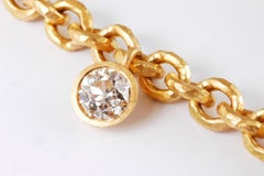 22 Carat Gold Hammered Graduated Chain Set with 1.55 Carat Old Cut Diamond