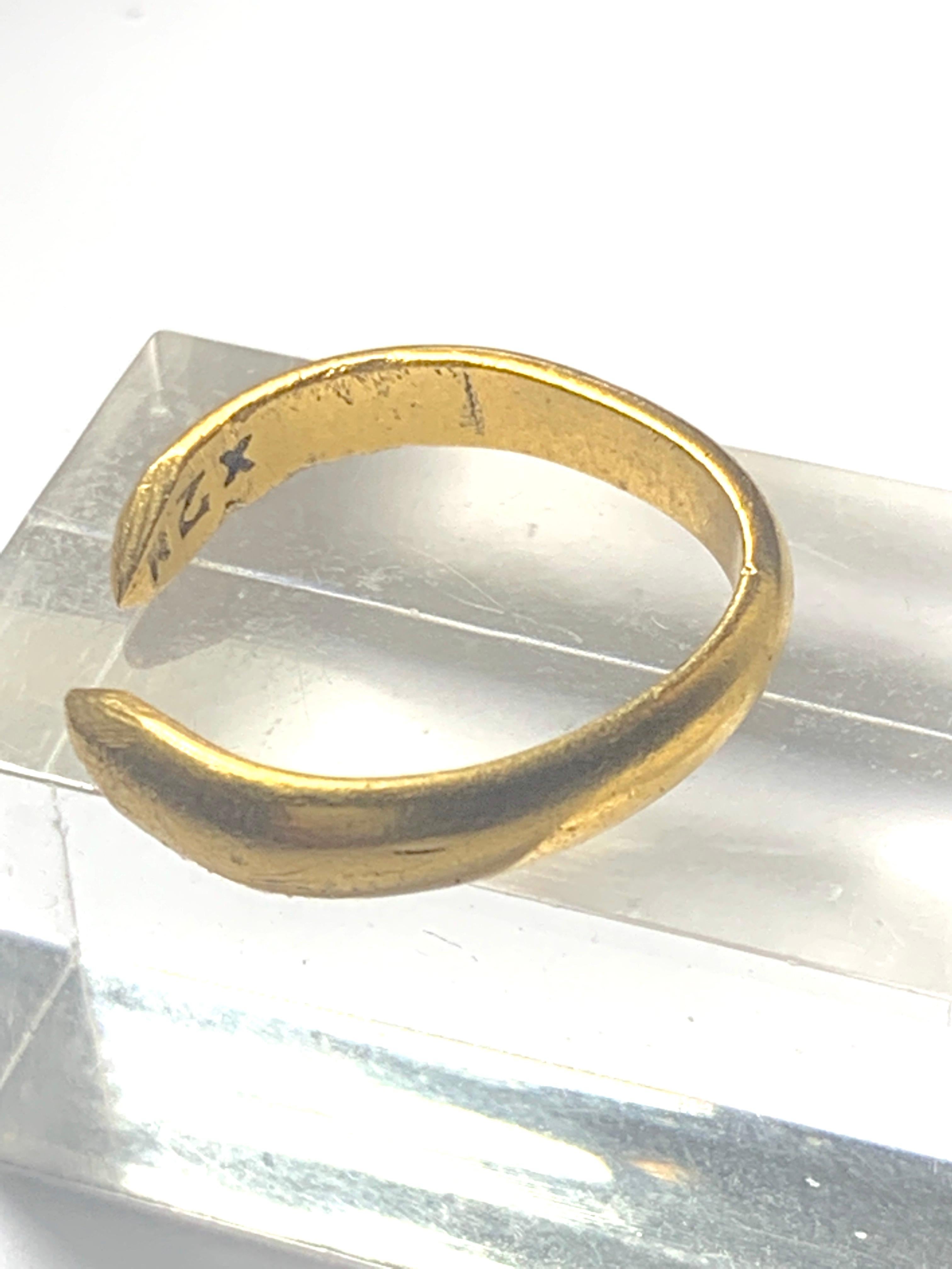 22ct Gold open band ring
with shaped ends
Fully Hallmarked (British) dated 1965
Inner diameter is 16mm
The ring is not round - so difficult to state a size
I'd assume  K 1/2 - L
Weight 4.8 grams
Please note this appears to be a reshaped band ring -