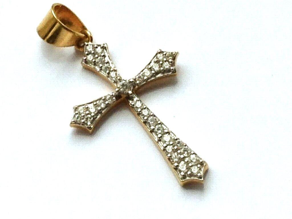 22ct 916 Gold Cross
unknown Gem stones ( definitely not diamonds ) are all present 
Fully Hallmarked by Birmingham Assay Offices 
Goldsmiths SJPL
size 2.5cm x 1,5 cm (Incl. 5mm Bail )