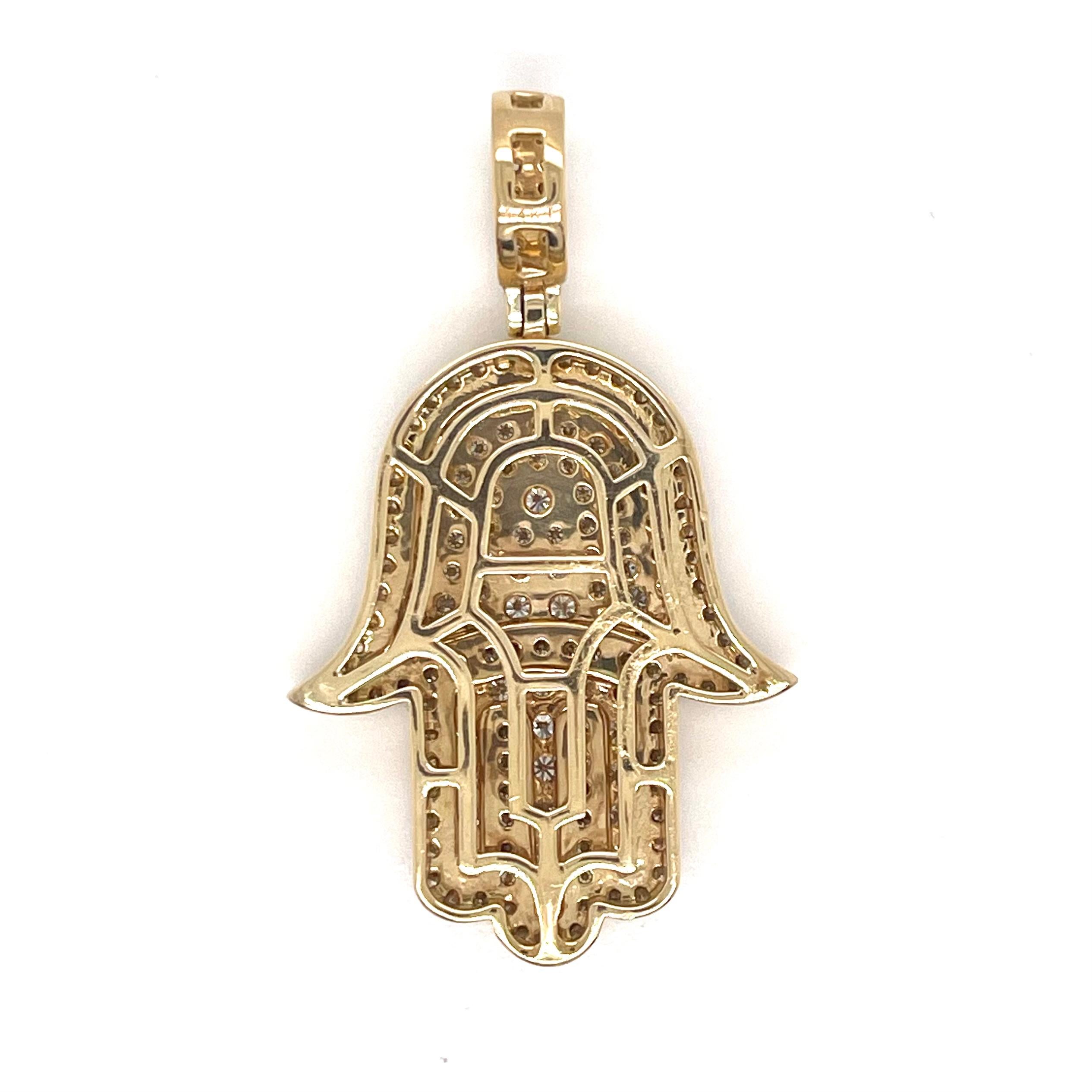 Style: Diamond Hamsa Pendant

Metal: Yellow Gold

Metal Purity: 14K

Stones: 169 Diamonds

Diamond Color: I​

Diamond Clarity: VS1

Total Carat Weight (ct): Approx 2.2 ct

Total Item Weight (g): 10.5 g 

Dimensions: 4.5 cm (including