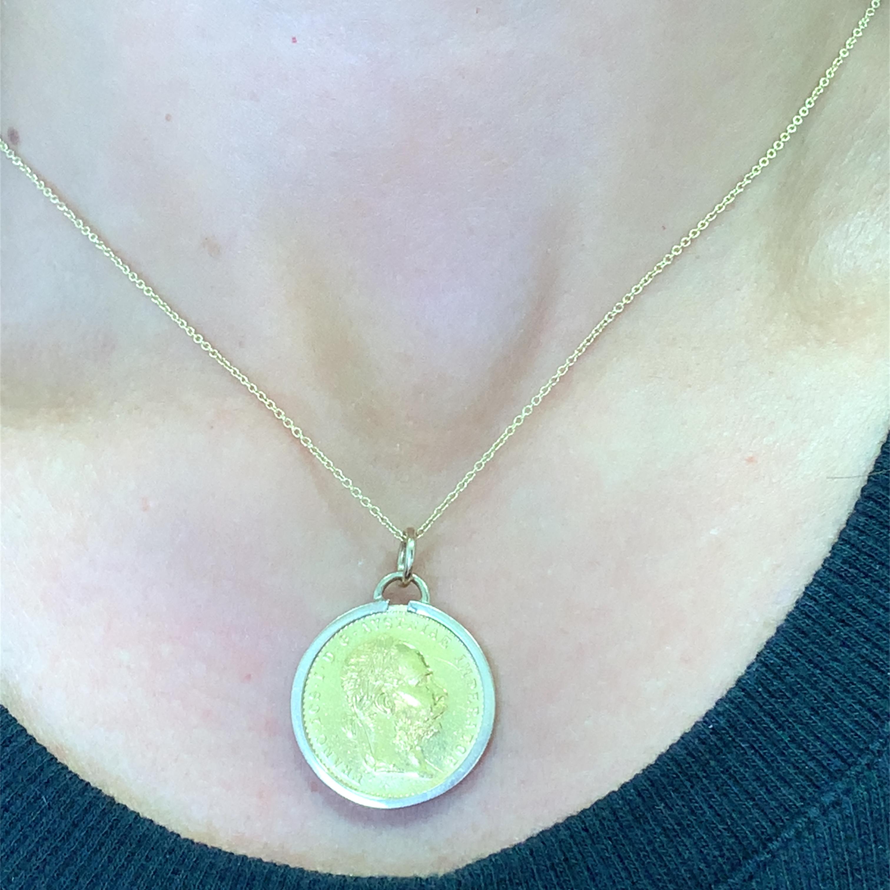22ct Yellow gold Franc Ios Austria Ducat Coin pendant.
Chunky pure 22k yellow gold rare Austrian collectable coin shaped pedant necklace.
Austrian gold coin pendant, coin 22ct pure yellow gold composition 0.986. Framed in 9ct yellow gold pendant.